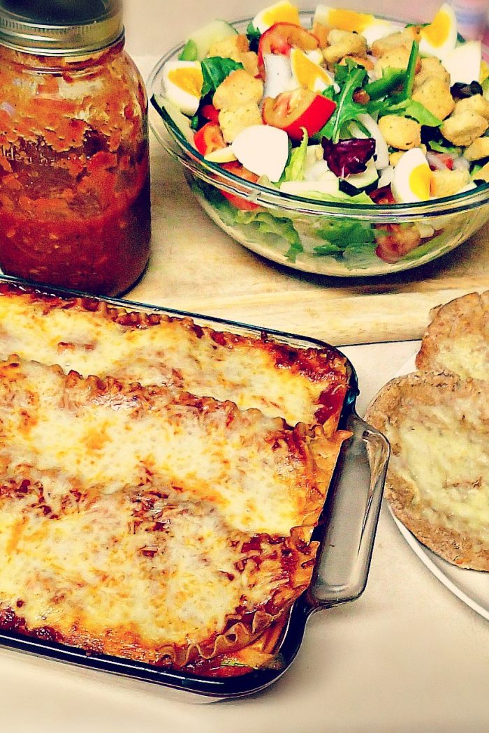 Vegetable Lasagna, Garlic Pitas, & Salad.