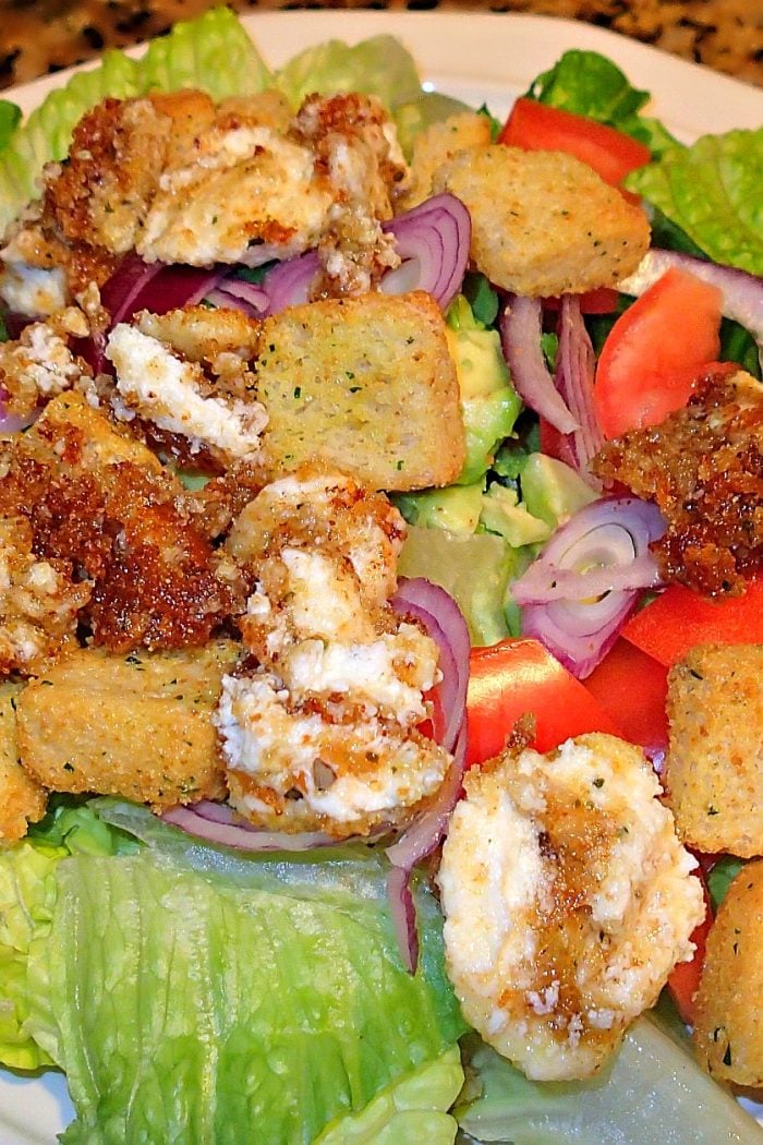 Healthy Fried Goat Cheese Crumbles Over A Crisp Salad