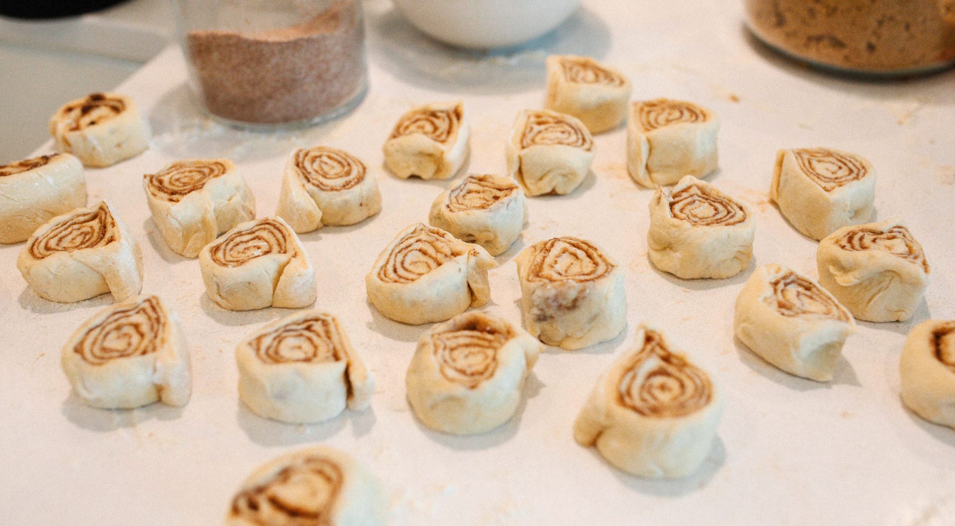 the best cinnamon rolls you'll ever eat, easy to make cinnamon rolls, cinnamon rolls, baking, baked cinnamon rolls, cinnamon rolls from scratch, homemade cinnamon buns, frosting, vanilla frosting, cinnamon rolls, frosted cinnamon rolls,