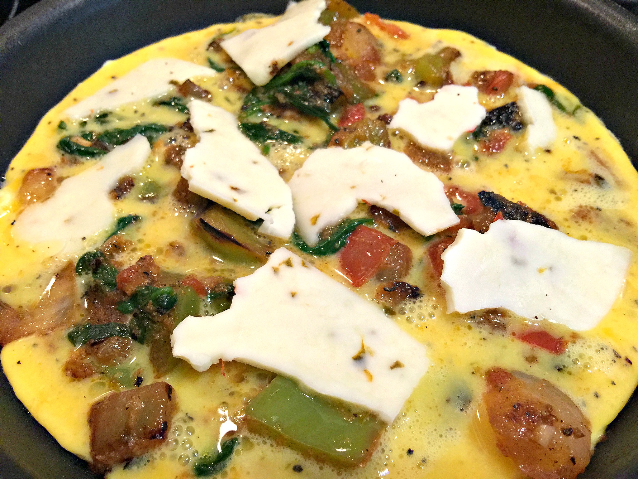 Vegetable Omelet: Sautéed Onions, Tomatoes, Spinach, Bell Peppers with Pepperjack Cheese. 