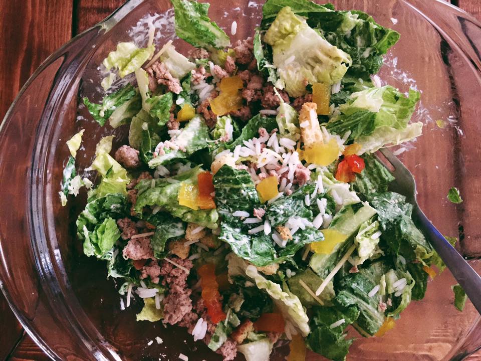 salad with ground turkey, asiago cheese, white rice, romaine, dressing, croutons, and banana peppers,
