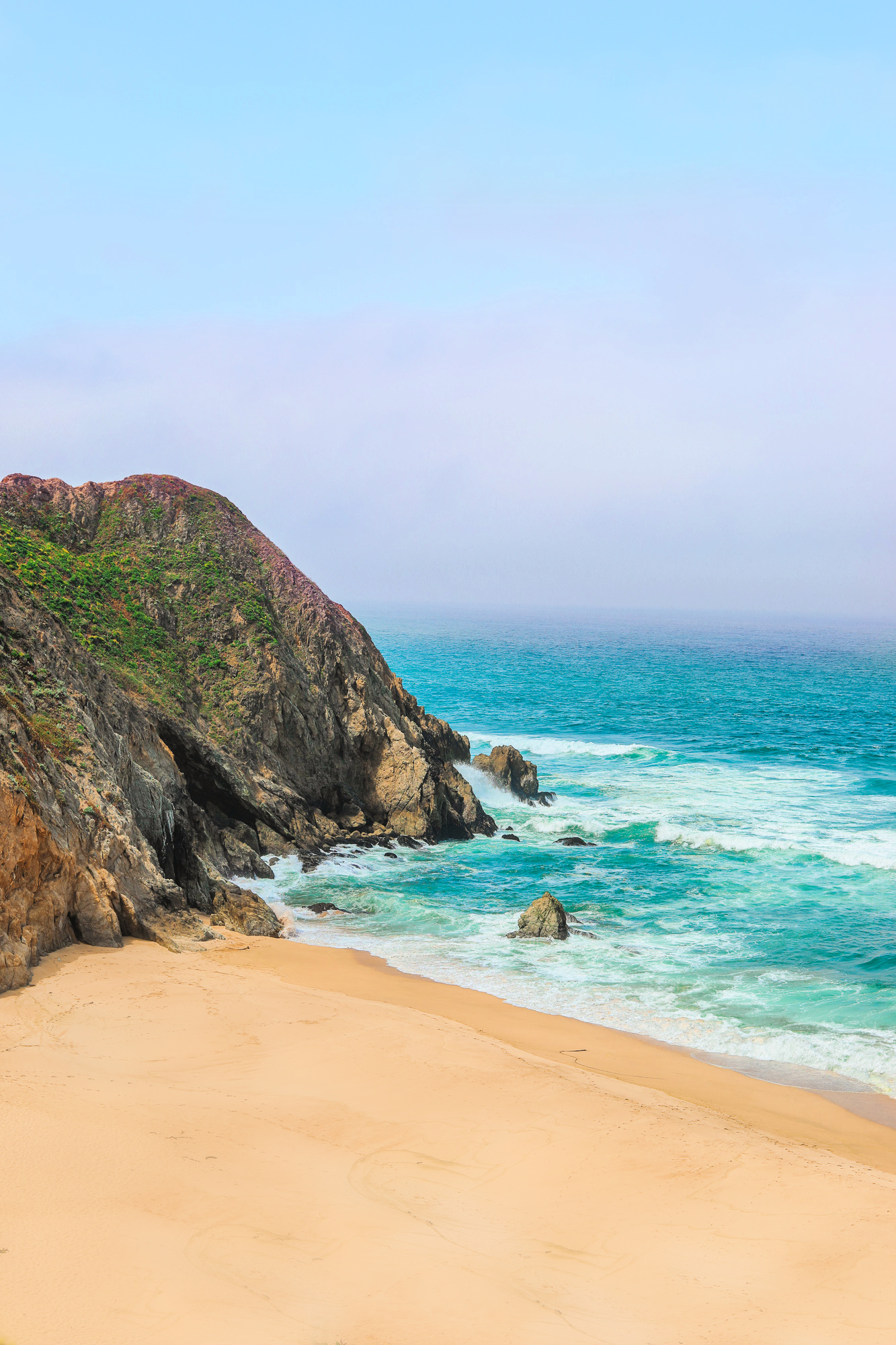 pacific coast highway, summer travel, road trip, itinerary , California coast, grey whale cove, the coast of California road trip guide, travel, summer, san fransico, fun, summer trip, blogging, highway one, traveling the coast of cali, ocean, pacific, mountains, photography,
