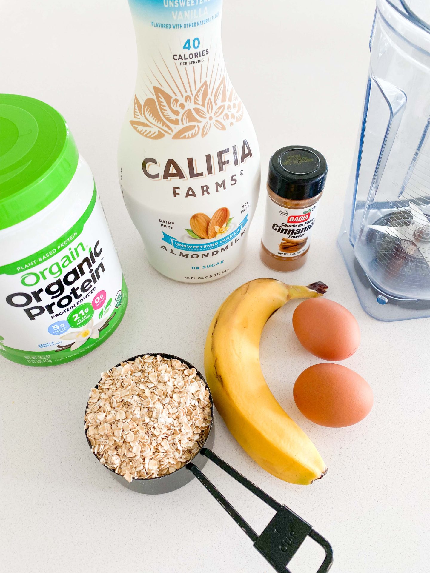 oatmeal pancakes, healthy pancakes, healthy breakfast, what to have for breakfast, gluten free, dairy free, protein packed, blueberry, banana, plant based protein powder, almond milk, kid-friendly, good food, meal prep, how to make protein oat pancakes, macros