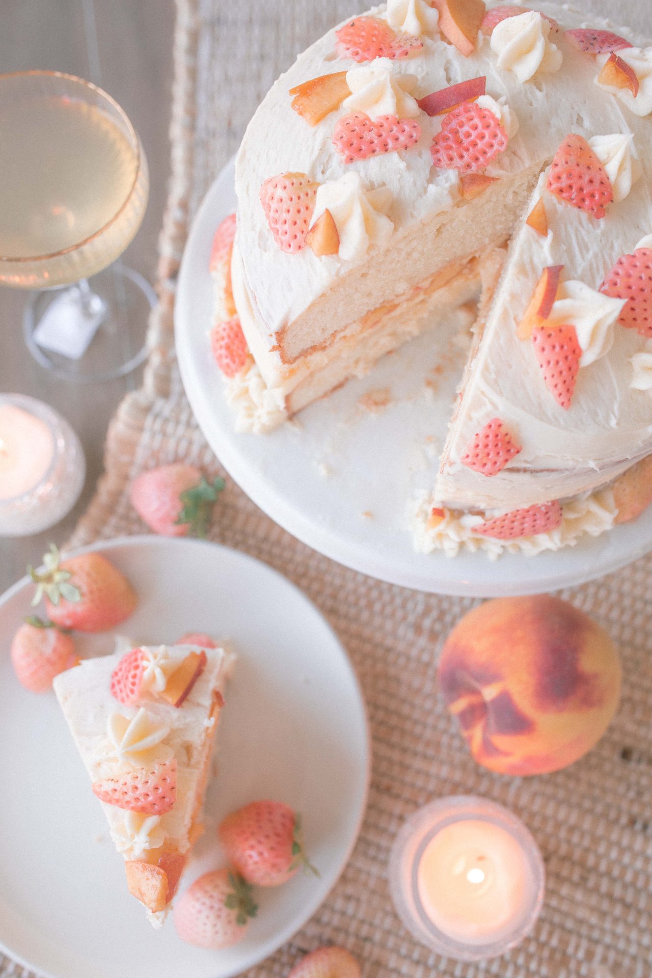 cake, almond cake, wedding cake, pineberries, pineberry recipe, what to make with pineberries, strawberries, peach cake, almond wedding cake, almond buttercream, easy cake recipe, amazing cake, dessert, spring cake, fruit cake, layered almond buttercream cake, the best cake flavors, how to make a layered cake