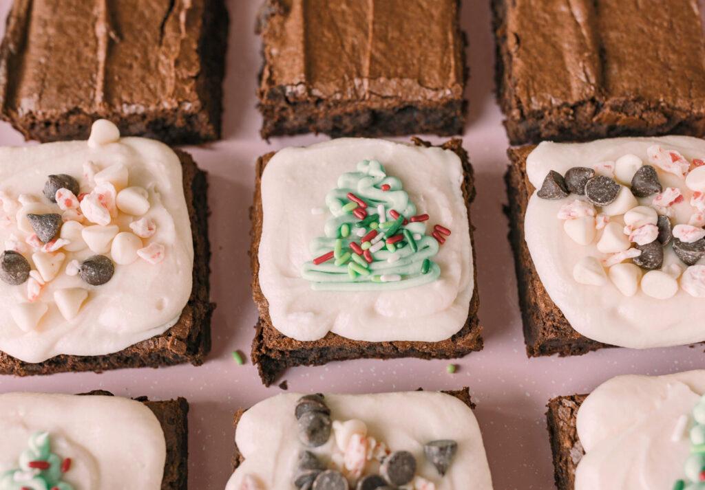 The BEST brownies you'll ever eat, fudge brownies, fudgy brownies, peppermint mocha, christmas baking, baking brownies, holiday baking, best brownies in the world, fudge brownies, gluten-free, buttery rich brownies, peppermint mocha flavored desserts, peppermint brownies, amazing brownies, holiday baking, chocolate brownies, peppermint mocha desserts, frosted brownies, peppermint mocha buttercream, brownies with christmas trees