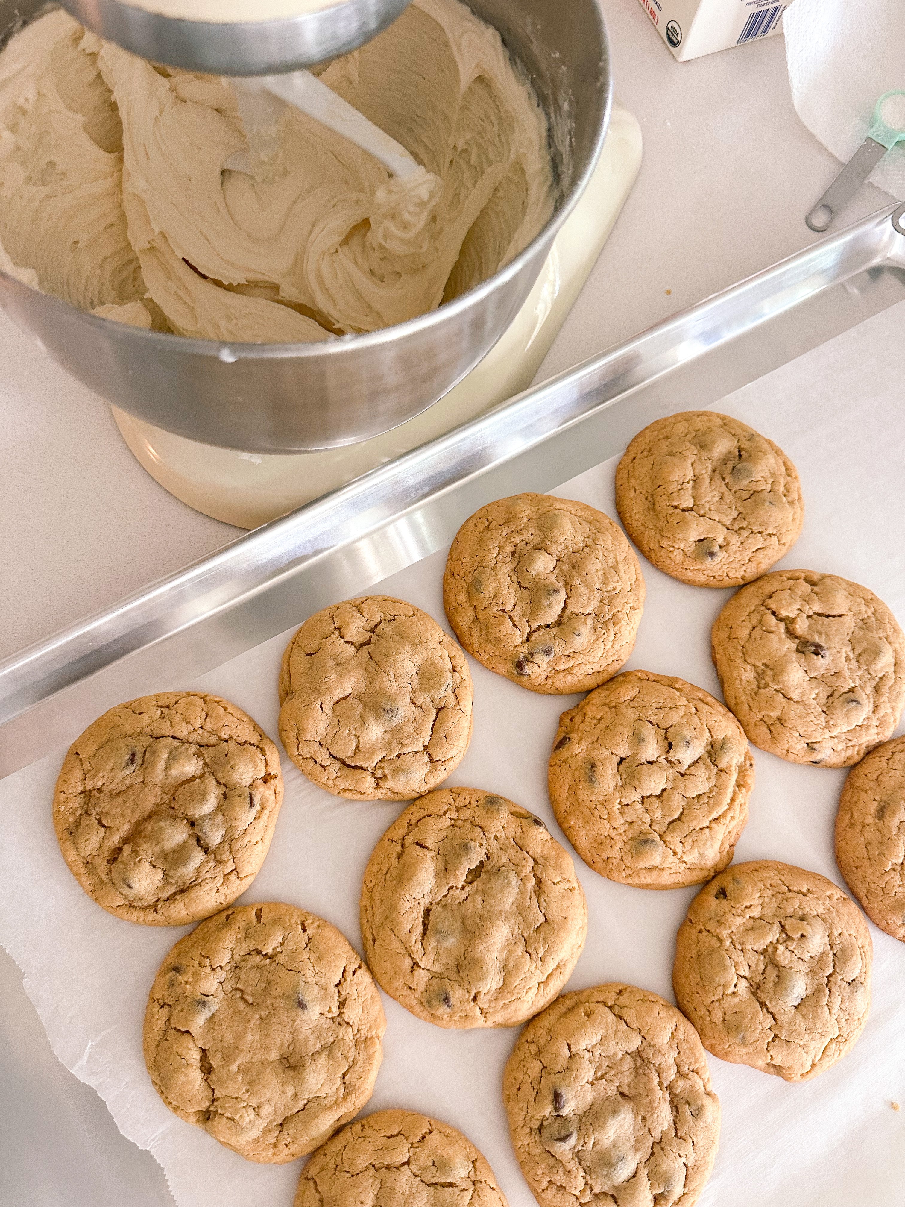 frosted cookies, snickers, dessert, candy bar, homemade salted caramel buttercream, buttercream frosting, peanut butter snickers cookies, peanut butter cookies, amazing dessert ever, the best frosted cookie recipe, salted caramel buttercream, peanut butter cookies, baking, soft, thick cookies, bakery, recipe