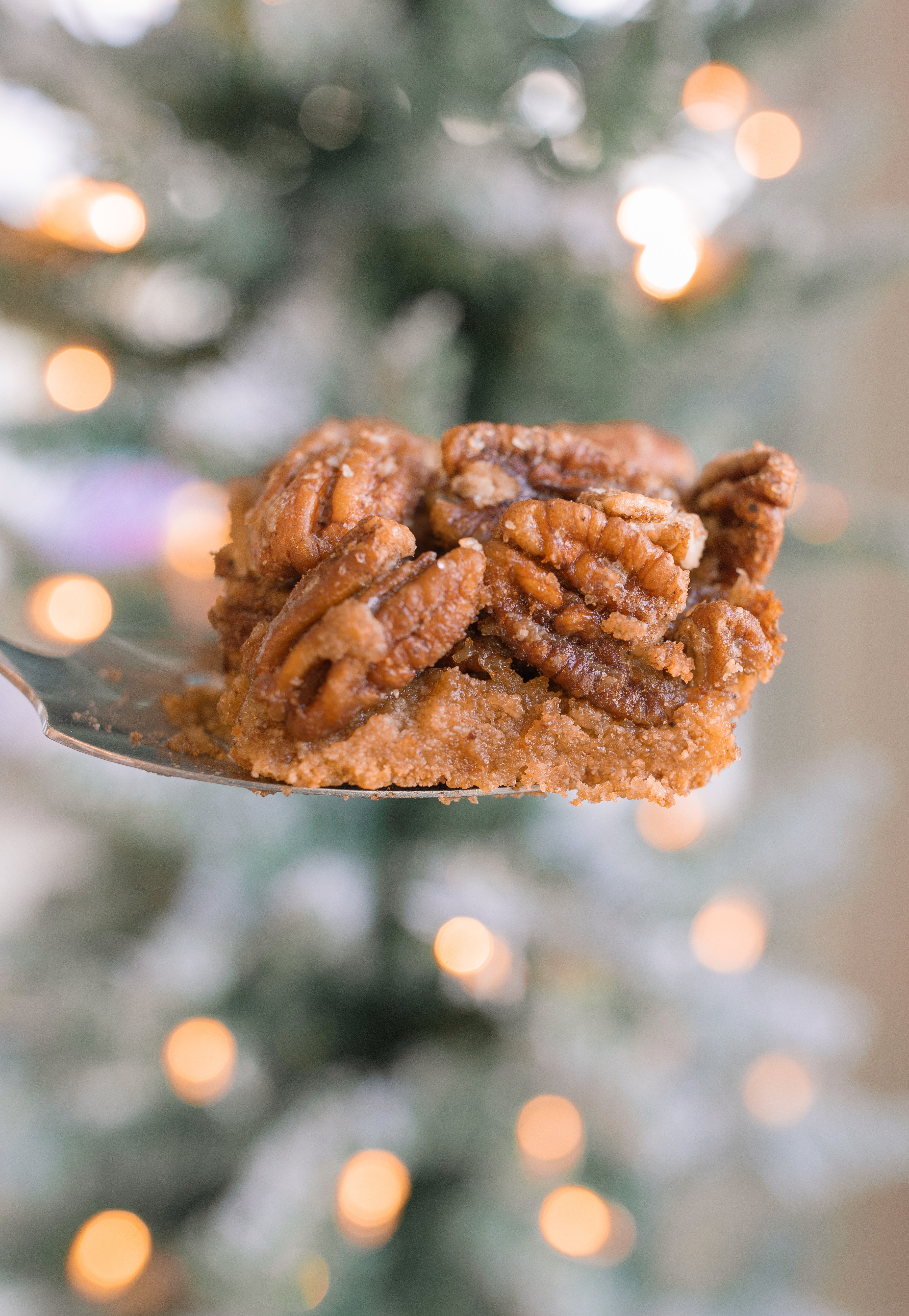 pecan bars, gluten free pecan bars, almond flour pecan bars, healthy pecan bars, refined sugar free pecan bars, maple pecan bars, coconut sugar pecan bars, paleo pecan bars, easy pecan bar recipe, thanksgiving pecan bars, thanksgiving dessert recipes, fall dessert recipes, healthy holiday desserts, gluten free thanksgiving desserts, no refined sugar desserts, maple syrup desserts, almond flour dessert recipes, coconut sugar desserts, easy holiday baking, healthy pecan pie bars