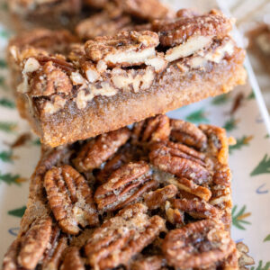 pecan bars, gluten free pecan bars, almond flour pecan bars, healthy pecan bars, refined sugar free pecan bars, maple pecan bars, coconut sugar pecan bars, paleo pecan bars, easy pecan bar recipe, thanksgiving pecan bars, thanksgiving dessert recipes, fall dessert recipes, healthy holiday desserts, gluten free thanksgiving desserts, no refined sugar desserts, maple syrup desserts, almond flour dessert recipes, coconut sugar desserts, easy holiday baking, healthy pecan pie bars