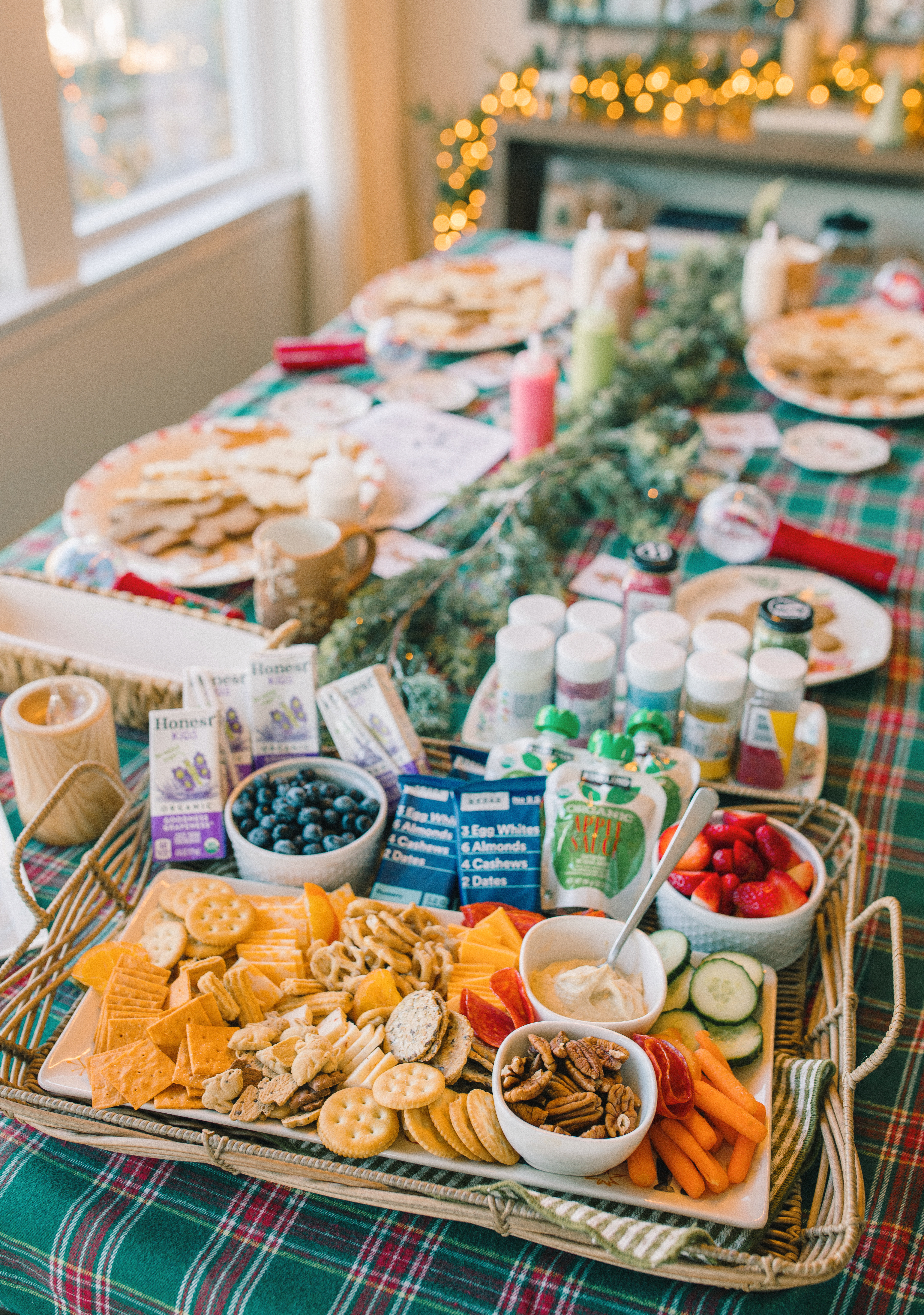 sugar cookie decorating party, cookie decorating with toddlers, mocktails for moms, cherry orange mocktail, cranberry, cookies, dye free, sprinkles, kids fun, pajama party, christmas decor, christmas party, kids charcuterie board