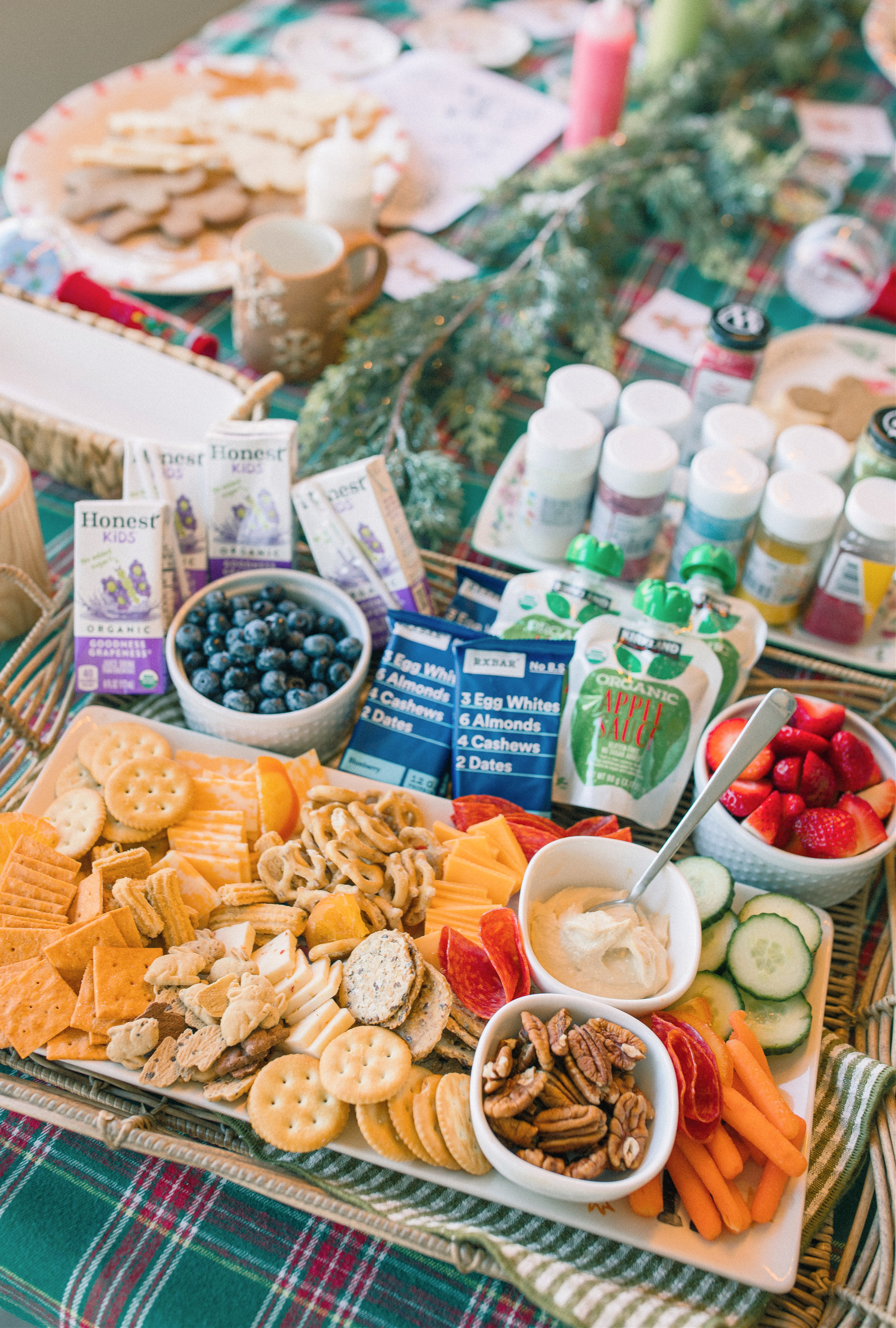 sugar cookie decorating party, cookie decorating with toddlers, mocktails for moms, cherry orange mocktail, cranberry, cookies, dye free, sprinkles, kids fun, pajama party, christmas decor, christmas party, kids charcuterie board