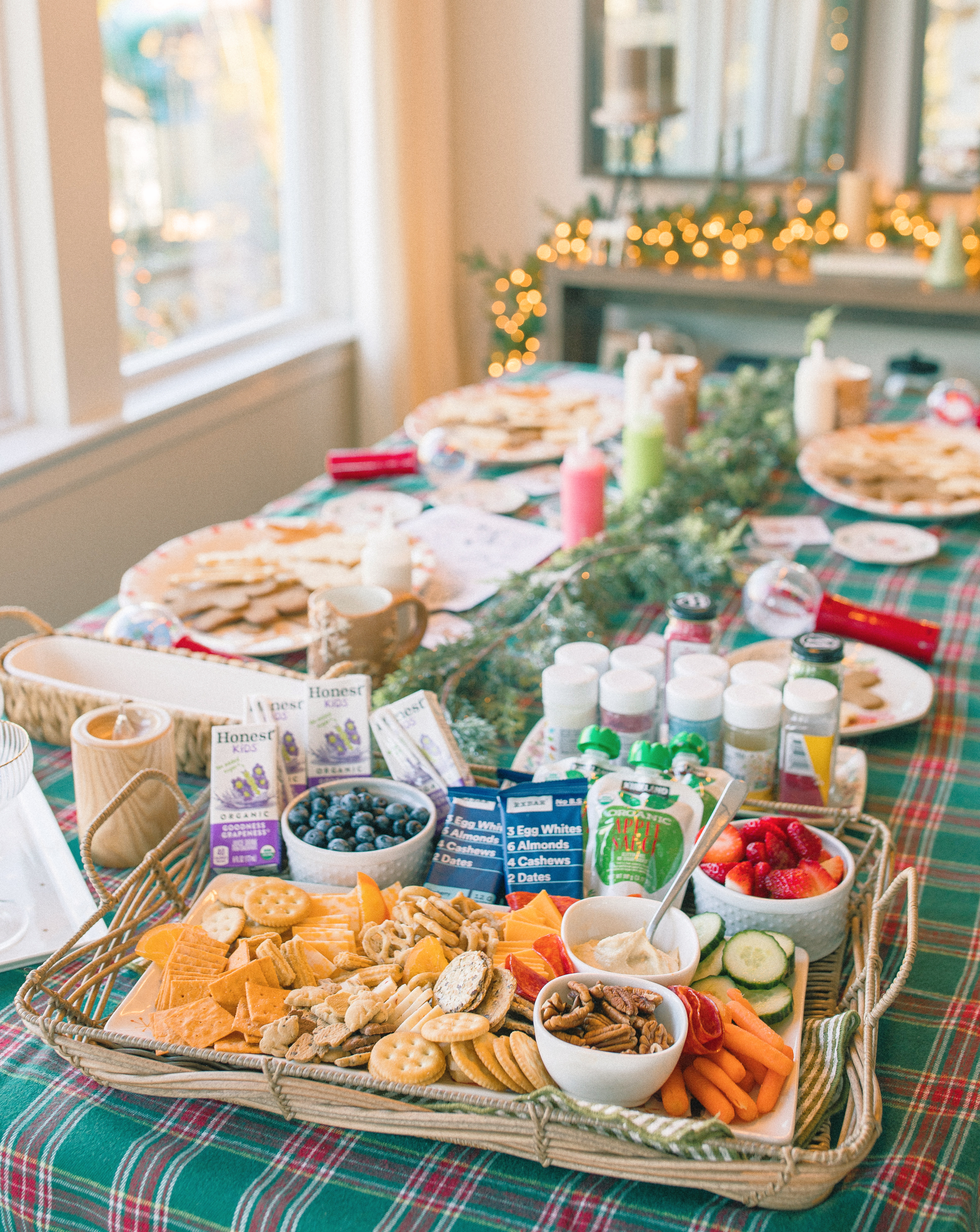 sugar cookie decorating party, cookie decorating with toddlers, mocktails for moms, cherry orange mocktail, cranberry, cookies, dye free, sprinkles, kids fun, pajama party, christmas decor, christmas party, kids charcuterie board