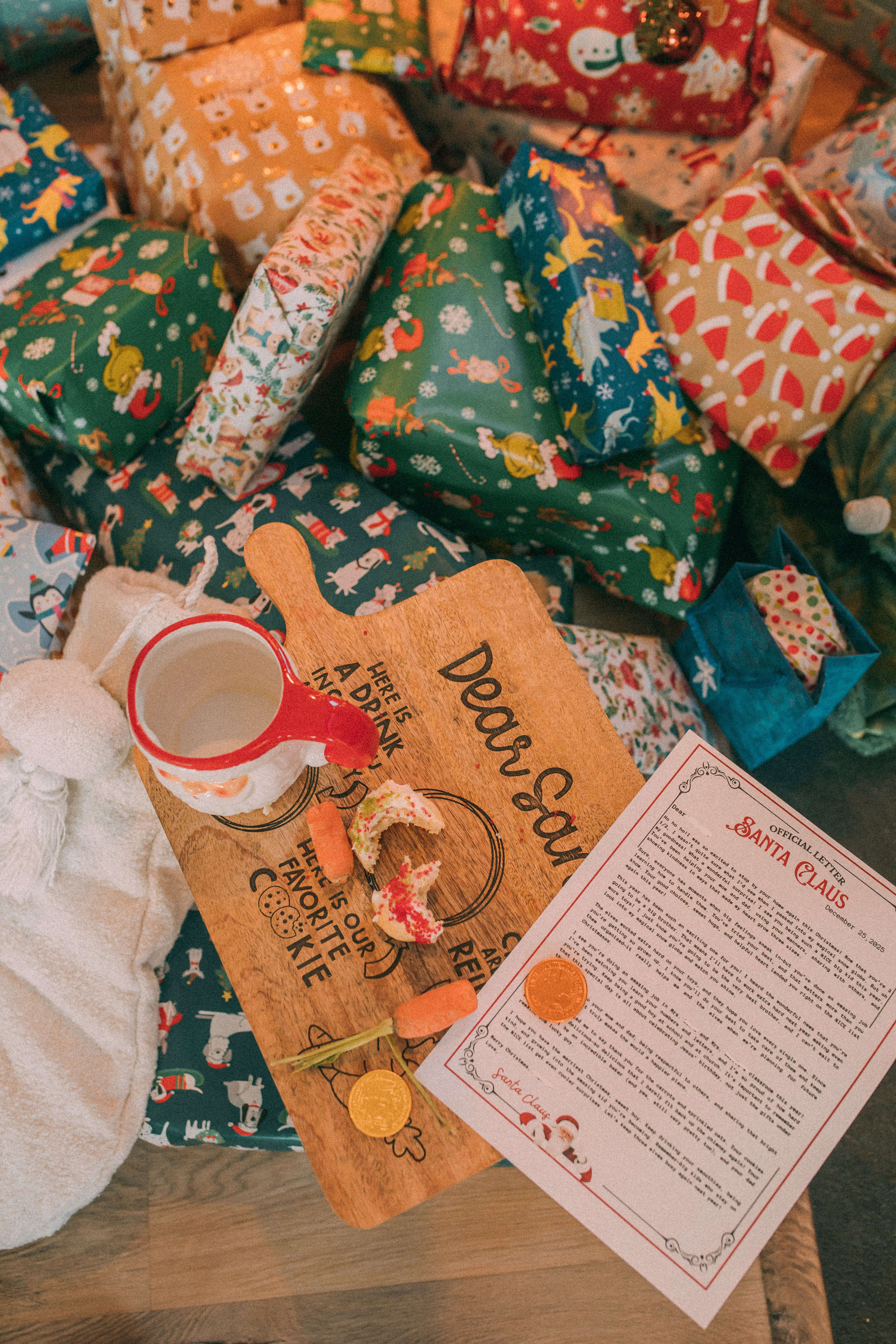 christmas recap, christmas morning, christmas blog, christmas decor, stockings, presents, toddler, dinner, table setting, home, lifestyle, blogging, motherhood, matching family pajamas, menu, holiday dinner, holiday celebrations, christmas day, pecan brownie pie, lottery pong, toddler gifts, cozy fireplace, cookies for santa, recap