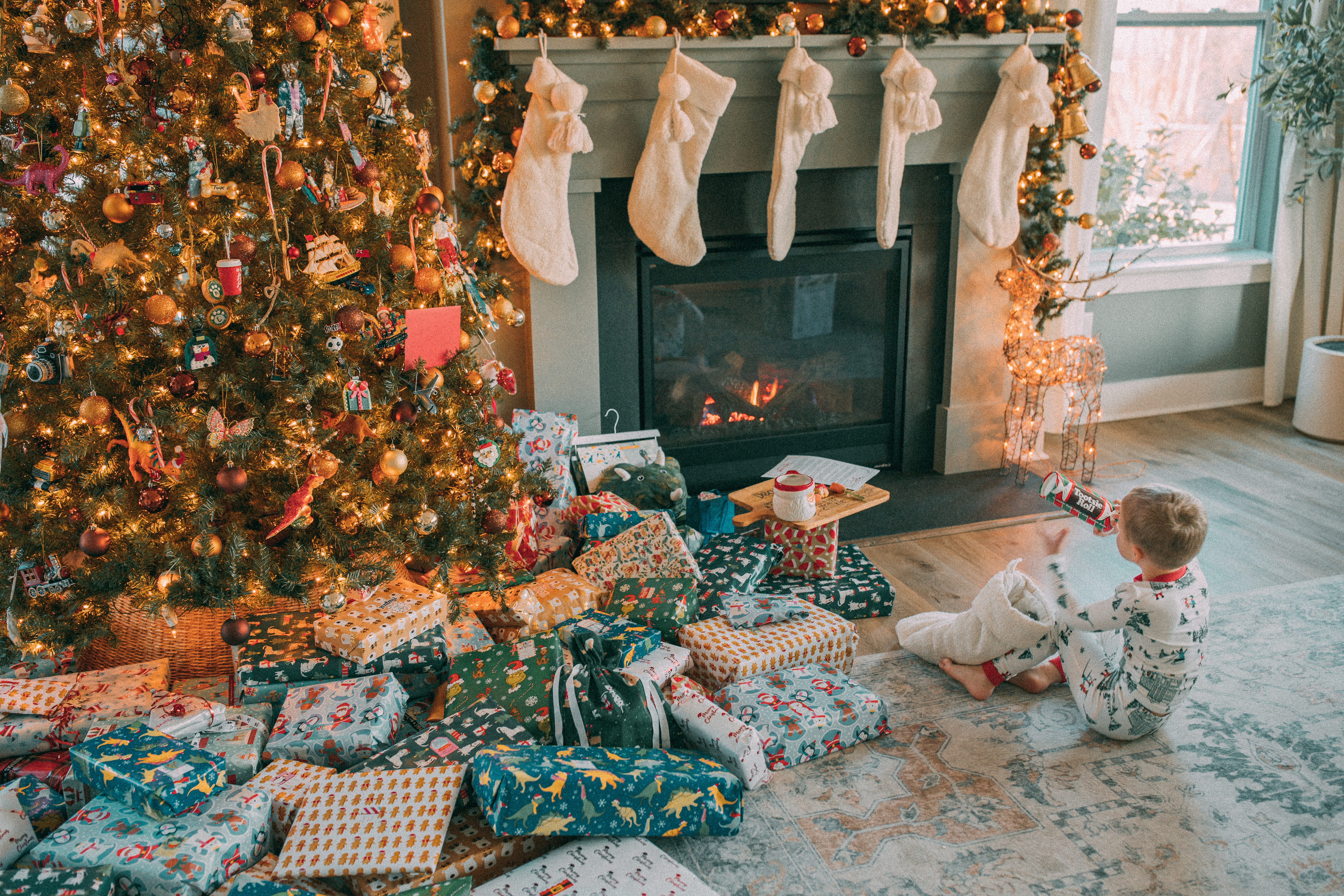 christmas recap, christmas morning, christmas blog, christmas decor, stockings, presents, toddler, dinner, table setting, home, lifestyle, blogging, motherhood, matching family pajamas, menu, holiday dinner, holiday celebrations, christmas day, pecan brownie pie, lottery pong, toddler gifts, cozy fireplace, cookies for santa, recap 