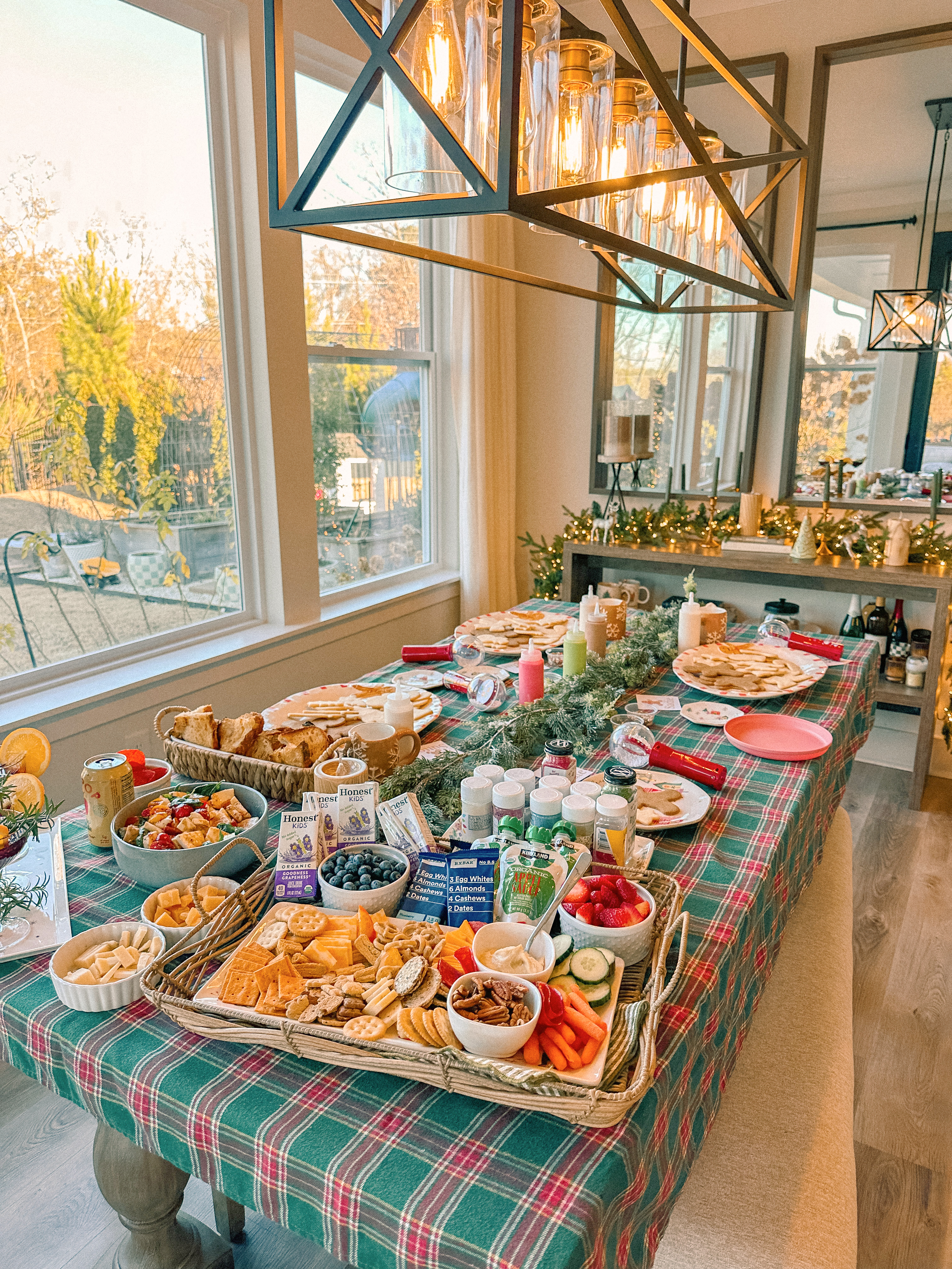 sugar cookie decorating party, cookie decorating with toddlers, mocktails for moms, cherry orange mocktail, cranberry, cookies, dye free, sprinkles, kids fun, pajama party, christmas decor, christmas party, kids charcuterie board