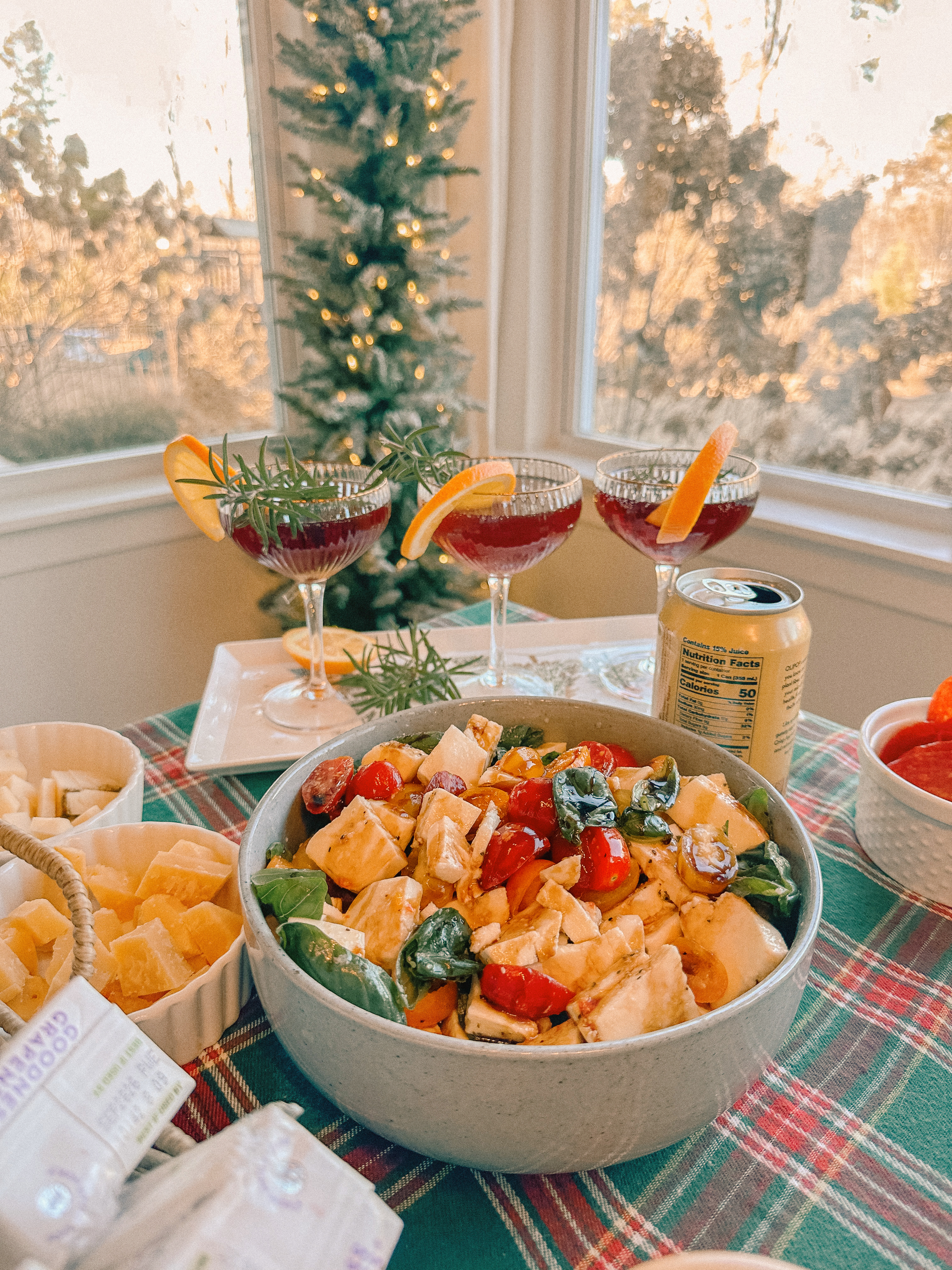 sugar cookie decorating party, cookie decorating with toddlers, mocktails for moms, cherry orange mocktail, cranberry, cookies, dye free, sprinkles, kids fun, pajama party, christmas decor, christmas party, kids charcuterie board