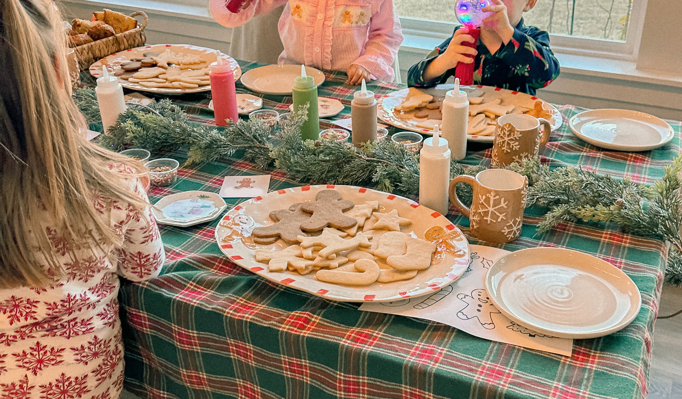 sugar cookie decorating party, cookie decorating with toddlers, mocktails for moms, cherry orange mocktail, cranberry, cookies, dye free, sprinkles, kids fun, pajama party, christmas decor, christmas party, kids charcuterie board