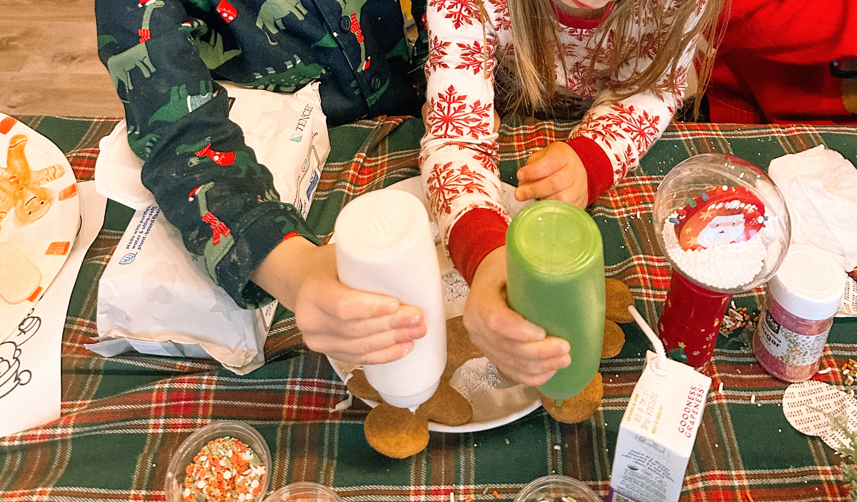 sugar cookie decorating party, cookie decorating with toddlers, mocktails for moms, cherry orange mocktail, cranberry, cookies, dye free, sprinkles, kids fun, pajama party, christmas decor, christmas party, kids charcuterie board