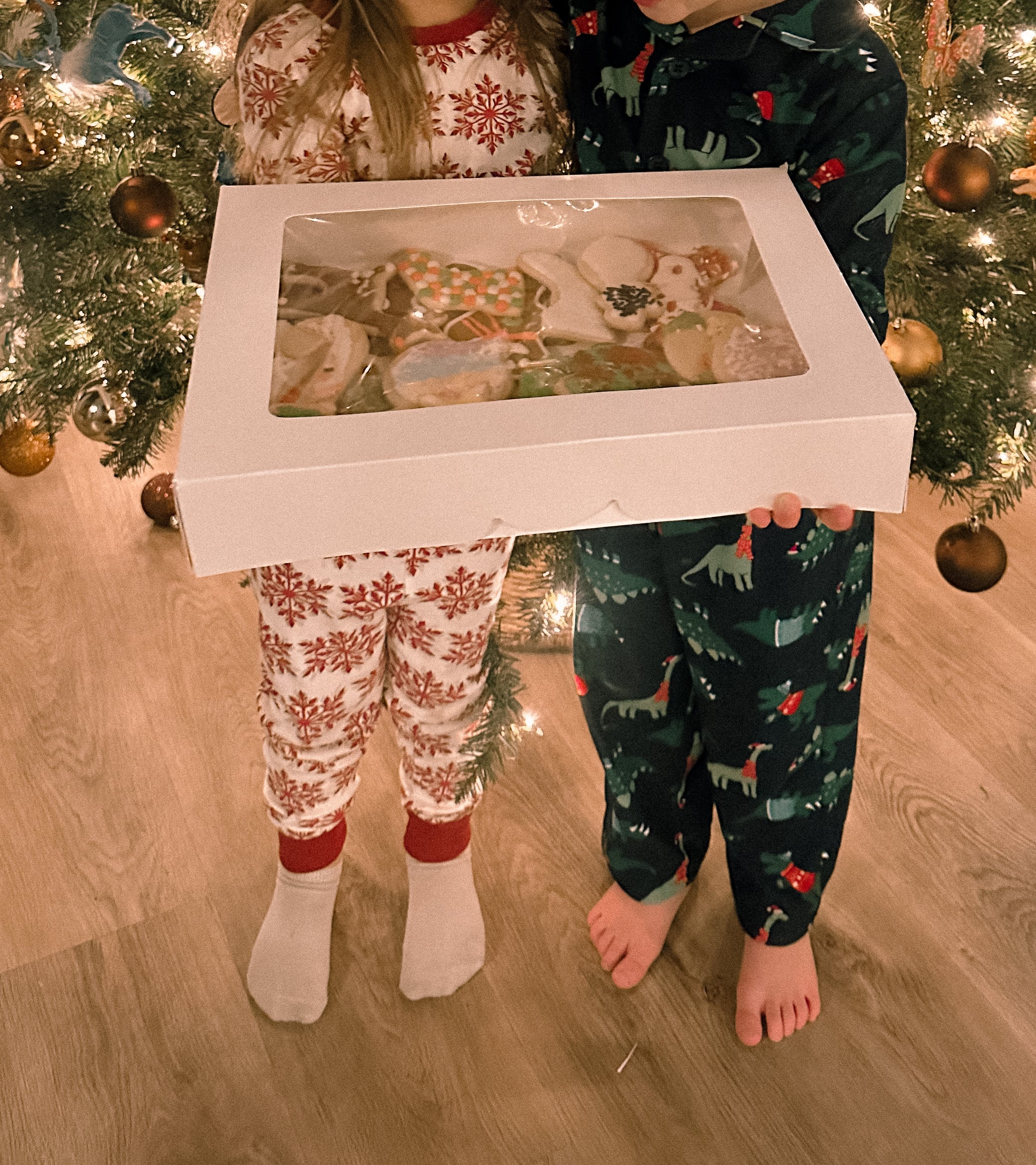 christmas recap, christmas morning, christmas blog, christmas decor, stockings, presents, toddler, dinner, table setting, home, lifestyle, blogging, motherhood, matching family pajamas, menu, holiday dinner, holiday celebrations, christmas day, pecan brownie pie, lottery pong, toddler gifts, cozy fireplace, cookies for santa, recap