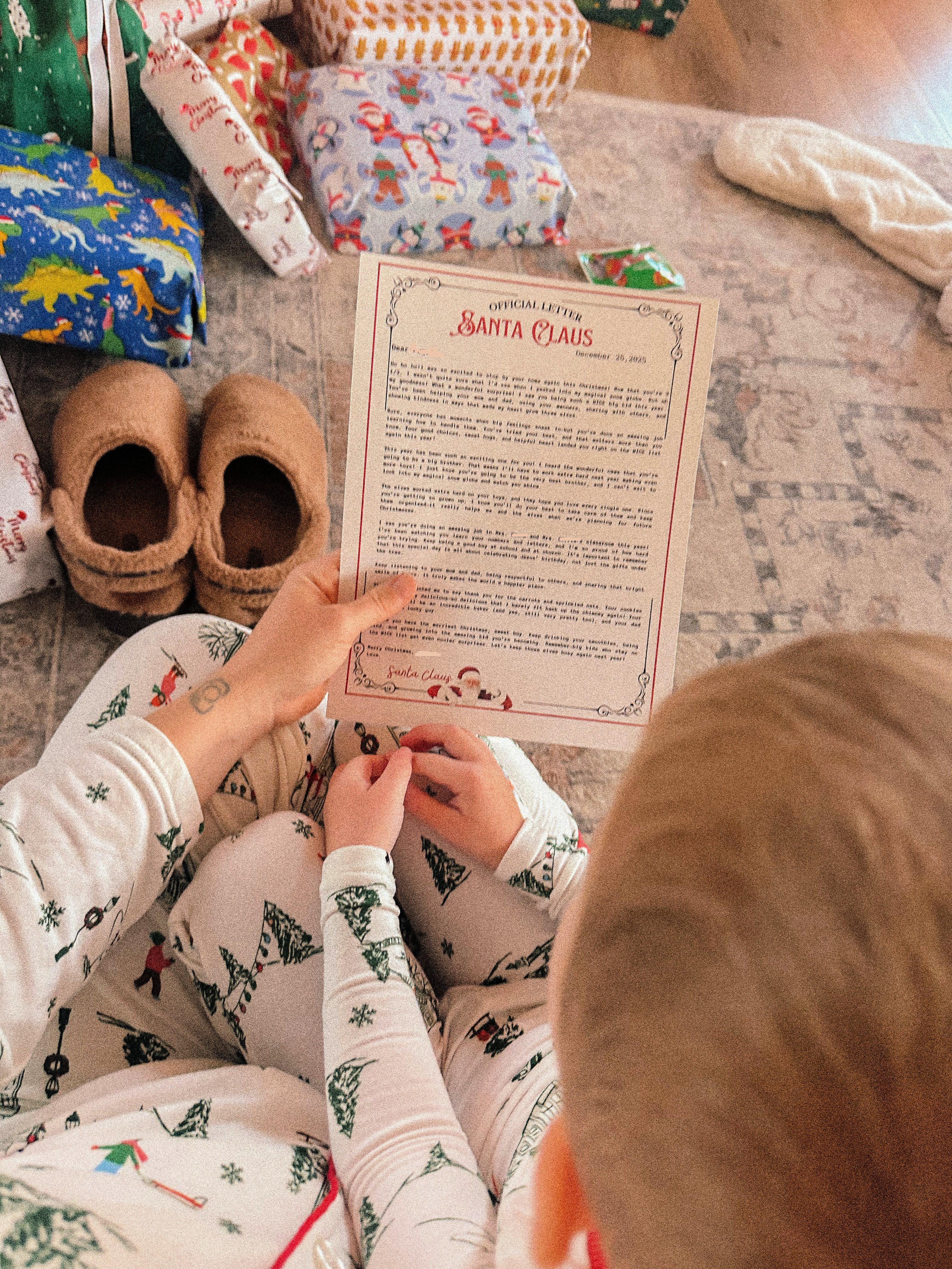 christmas recap, christmas morning, christmas blog, christmas decor, stockings, presents, toddler, dinner, table setting, home, lifestyle, blogging, motherhood, matching family pajamas, menu, holiday dinner, holiday celebrations, christmas day, pecan brownie pie, lottery pong, toddler gifts, cozy fireplace, cookies for santa, recap