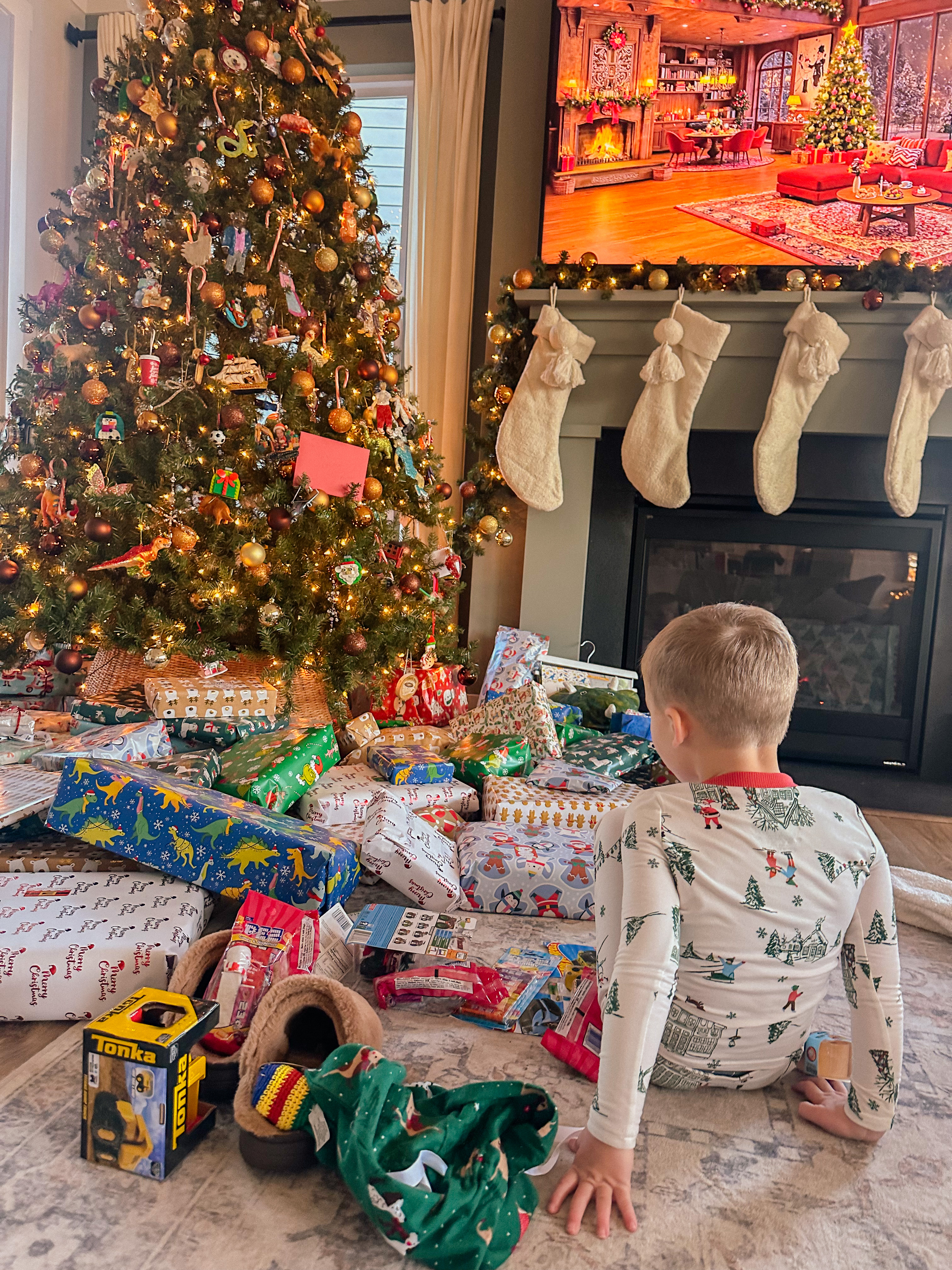 christmas recap, christmas morning, christmas blog, christmas decor, stockings, presents, toddler, dinner, table setting, home, lifestyle, blogging, motherhood, matching family pajamas, menu, holiday dinner, holiday celebrations, christmas day, pecan brownie pie, lottery pong, toddler gifts, cozy fireplace, cookies for santa, recap