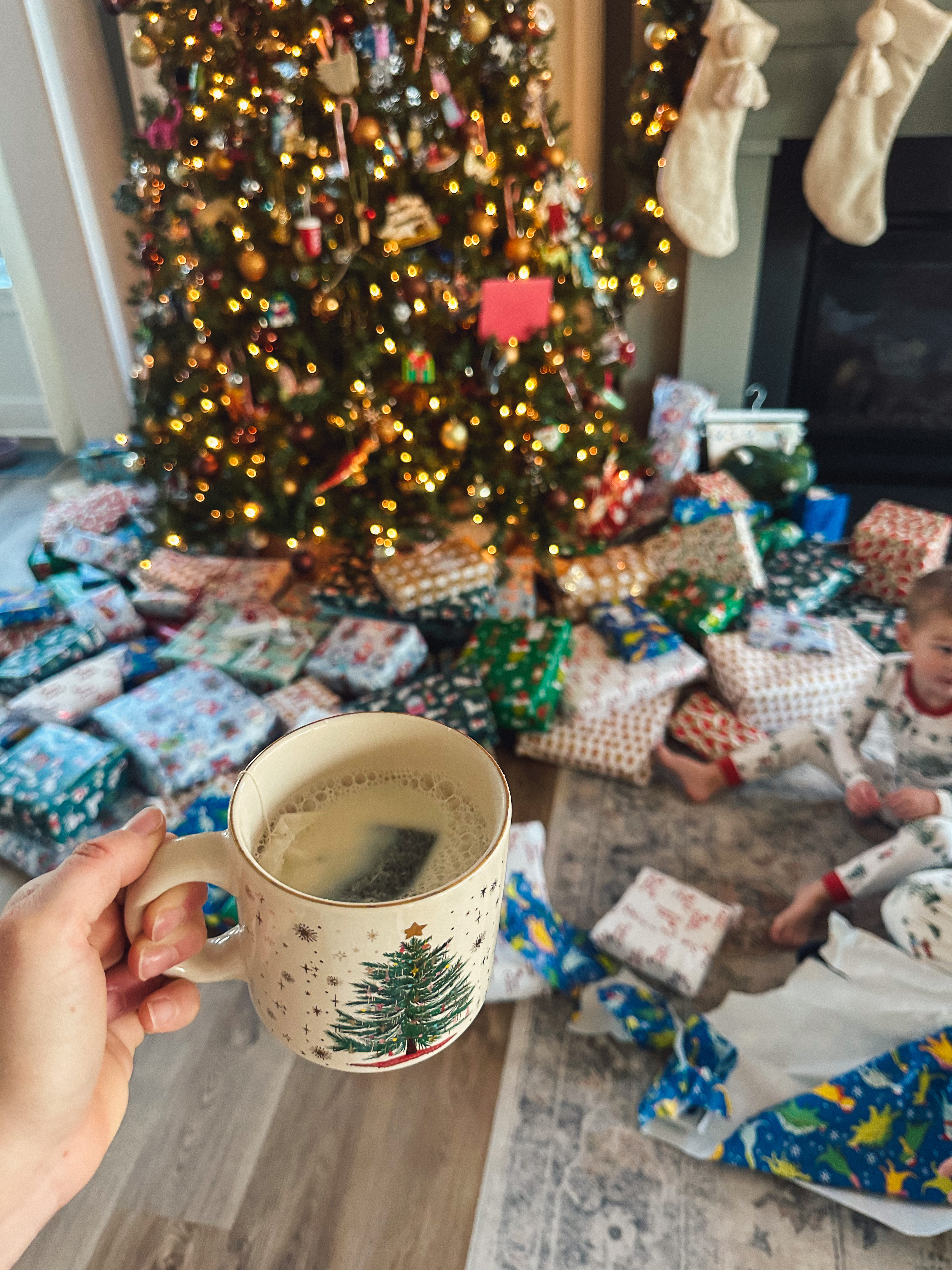 christmas recap, christmas morning, christmas blog, christmas decor, stockings, presents, toddler, dinner, table setting, home, lifestyle, blogging, motherhood, matching family pajamas, menu, holiday dinner, holiday celebrations, christmas day, pecan brownie pie, lottery pong, toddler gifts, cozy fireplace, cookies for santa, recap