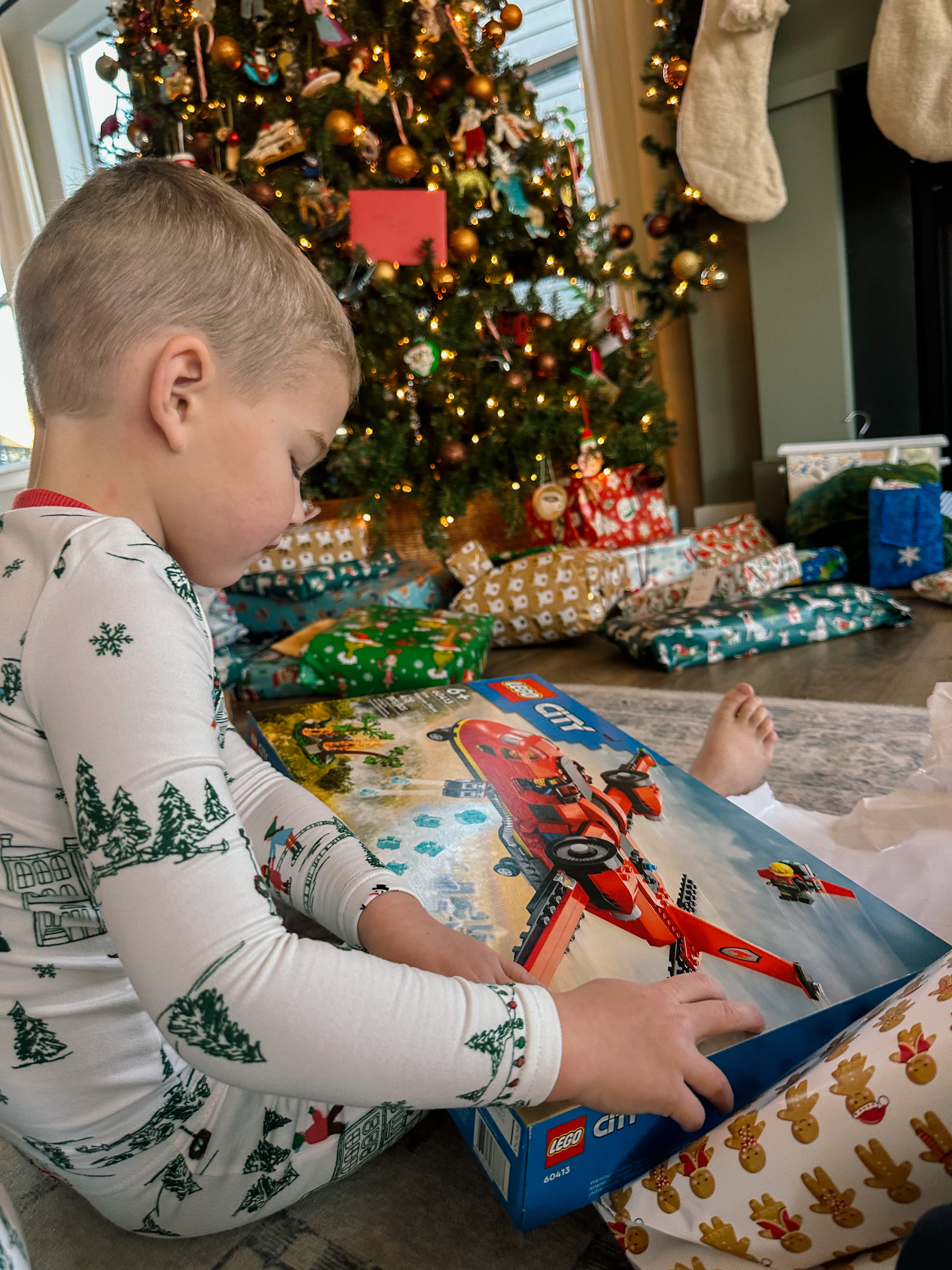 christmas recap, christmas morning, christmas blog, christmas decor, stockings, presents, toddler, dinner, table setting, home, lifestyle, blogging, motherhood, matching family pajamas, menu, holiday dinner, holiday celebrations, christmas day, pecan brownie pie, lottery pong, toddler gifts, cozy fireplace, cookies for santa, recap