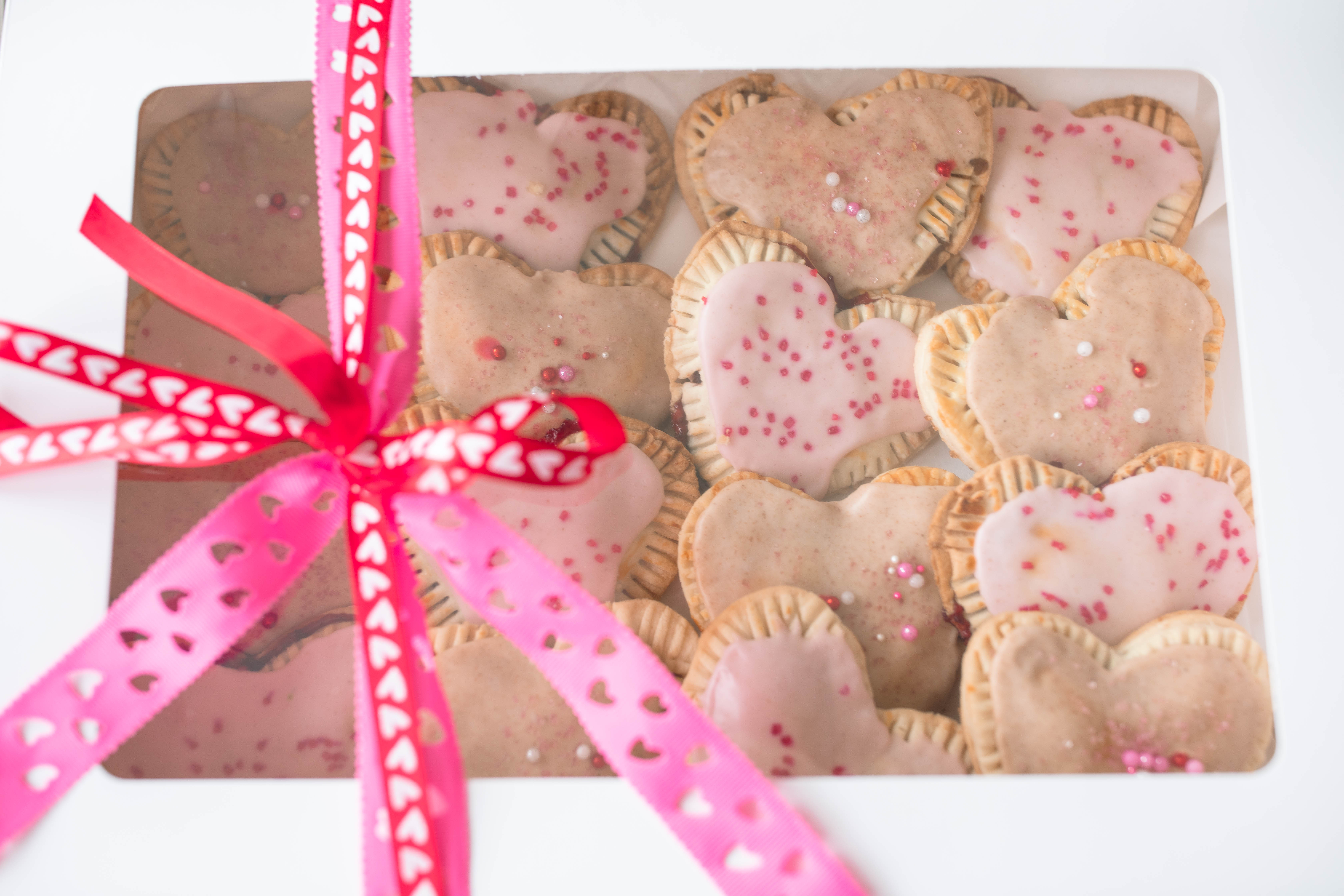 heart poptarts, cherry poptarts, brown sugar poptarts, cute poptart dessert, easy diy poptarts, valentines day, pastries, cherry almond poptarts, cute gift ideas, bakery box, recipe, easy dessert, frosted poptarts