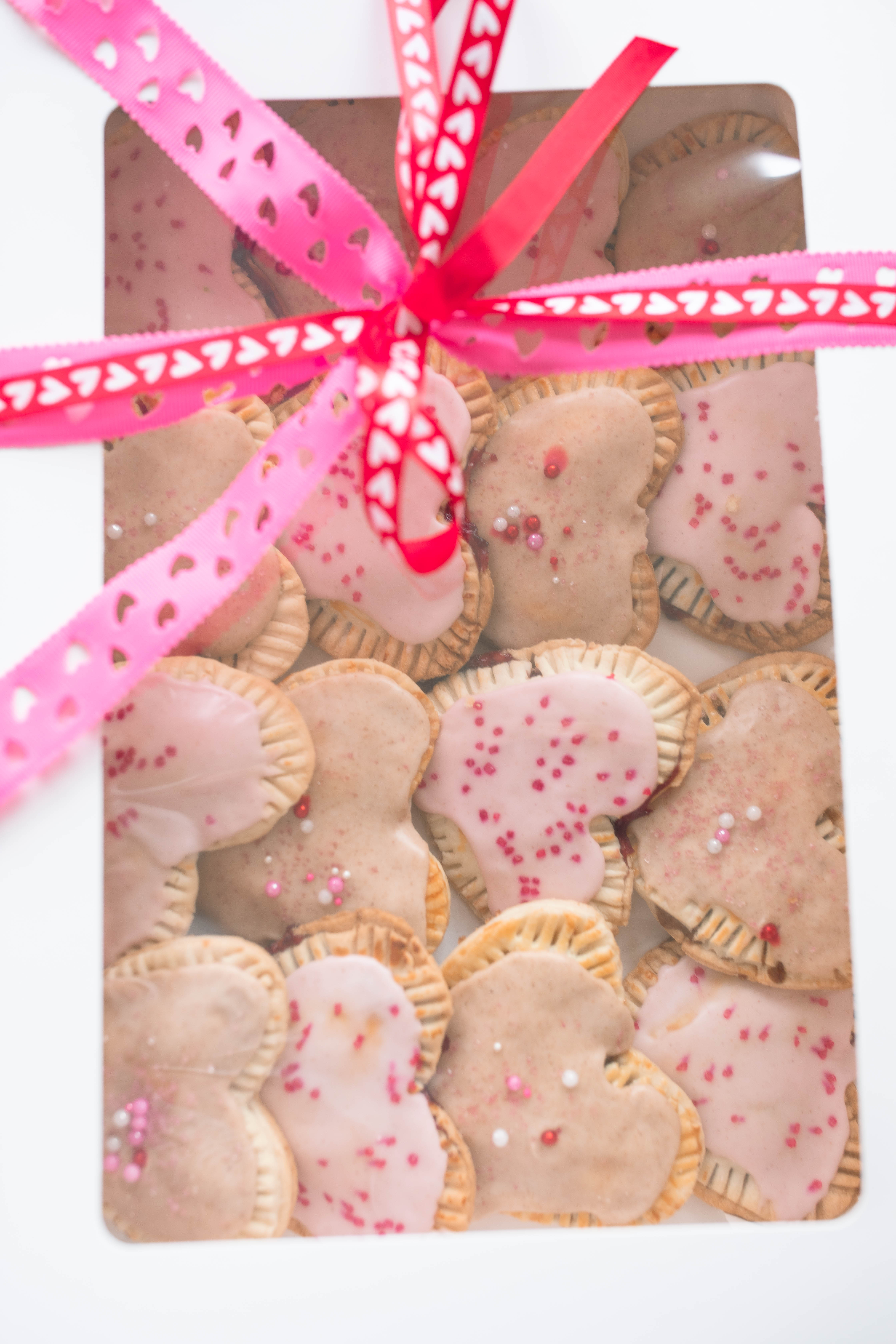 heart poptarts, cherry poptarts, brown sugar poptarts, cute poptart dessert, easy diy poptarts, valentines day, pastries, cherry almond poptarts, cute gift ideas, bakery box, recipe, easy dessert, frosted poptarts