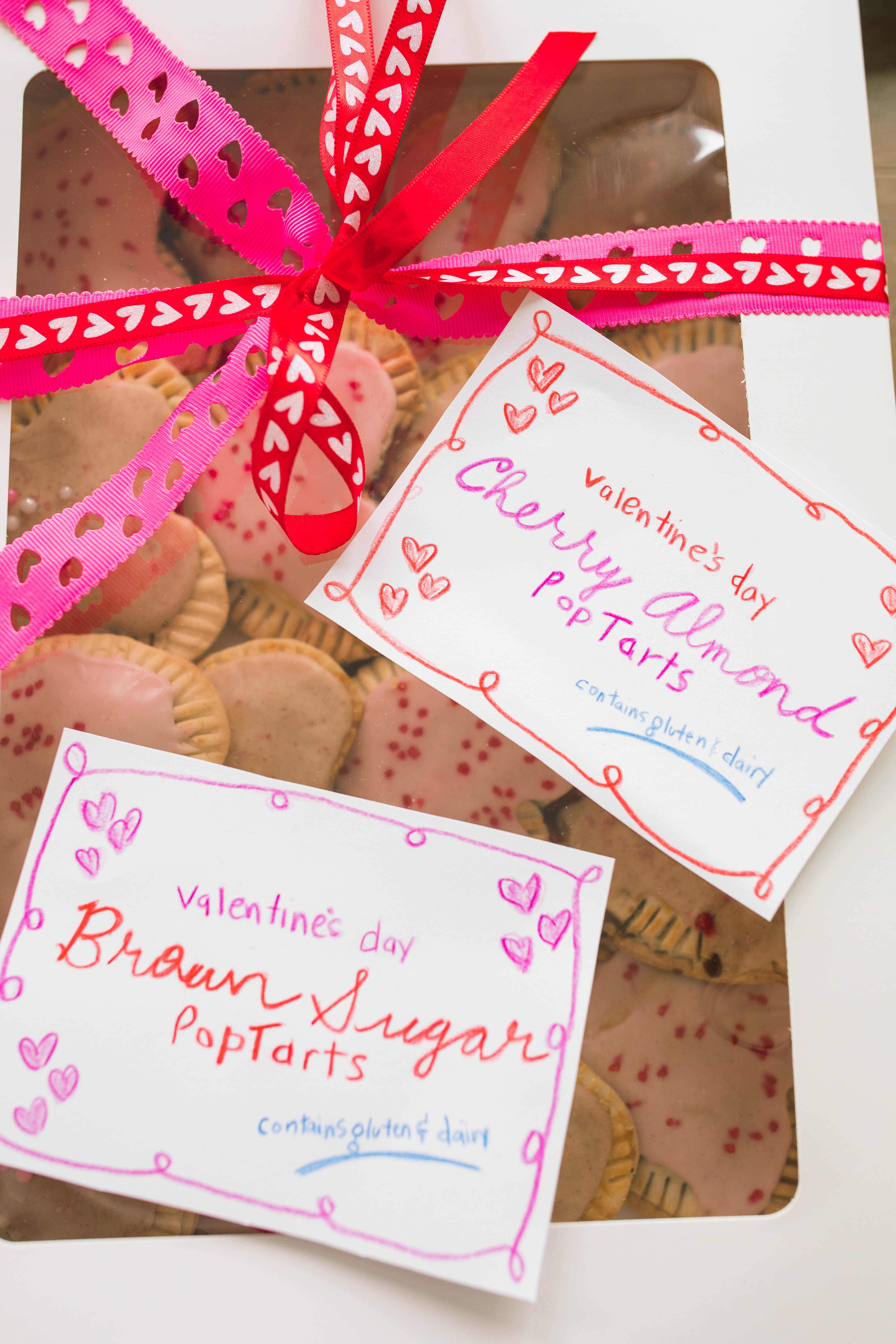 heart poptarts, cherry poptarts, brown sugar poptarts, cute poptart dessert, easy diy poptarts, valentines day, pastries, cherry almond poptarts, cute gift ideas, bakery box, recipe, easy dessert, frosted poptarts