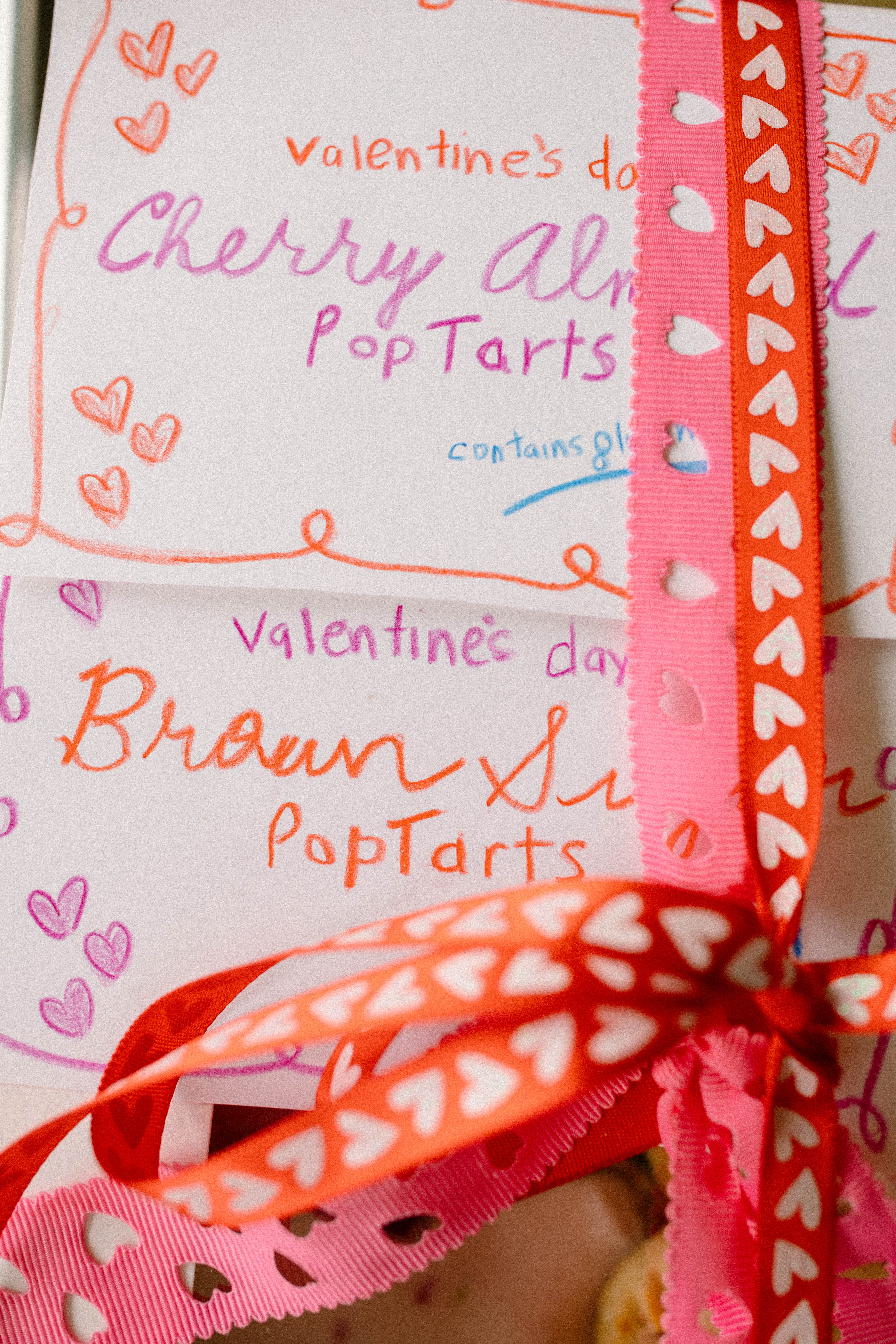 heart poptarts, cherry poptarts, brown sugar poptarts, cute poptart dessert, easy diy poptarts, valentines day, pastries, cherry almond poptarts, cute gift ideas, bakery box, recipe, easy dessert, frosted poptarts