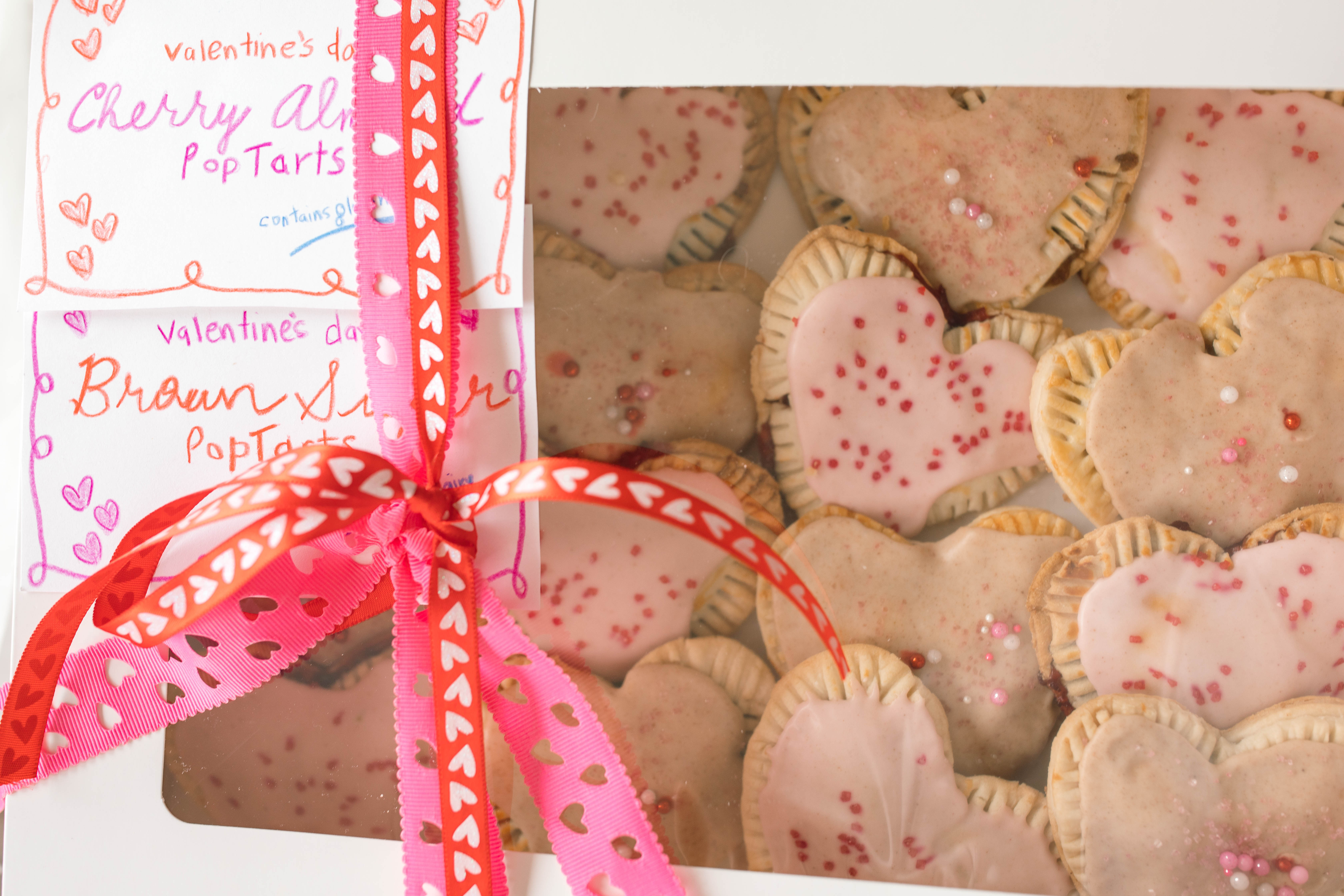 heart poptarts, cherry poptarts, brown sugar poptarts, cute poptart dessert, easy diy poptarts, valentines day, pastries, cherry almond poptarts, cute gift ideas, bakery box, recipe, easy dessert, frosted poptarts