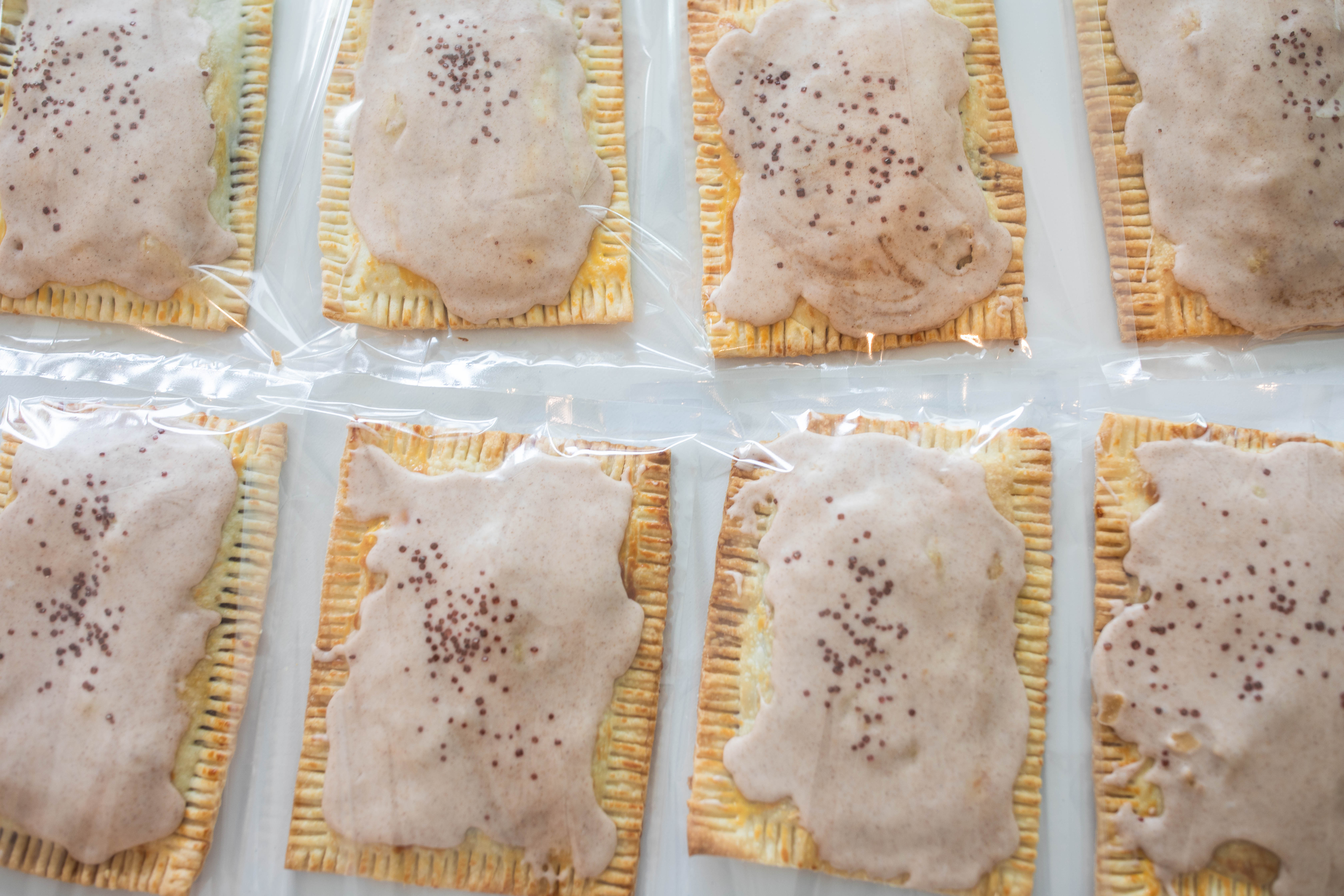 heart poptarts, cherry poptarts, brown sugar poptarts, cute poptart dessert, easy diy poptarts, valentines day, pastries, cherry almond poptarts, cute gift ideas, bakery box, recipe, easy dessert, frosted poptarts