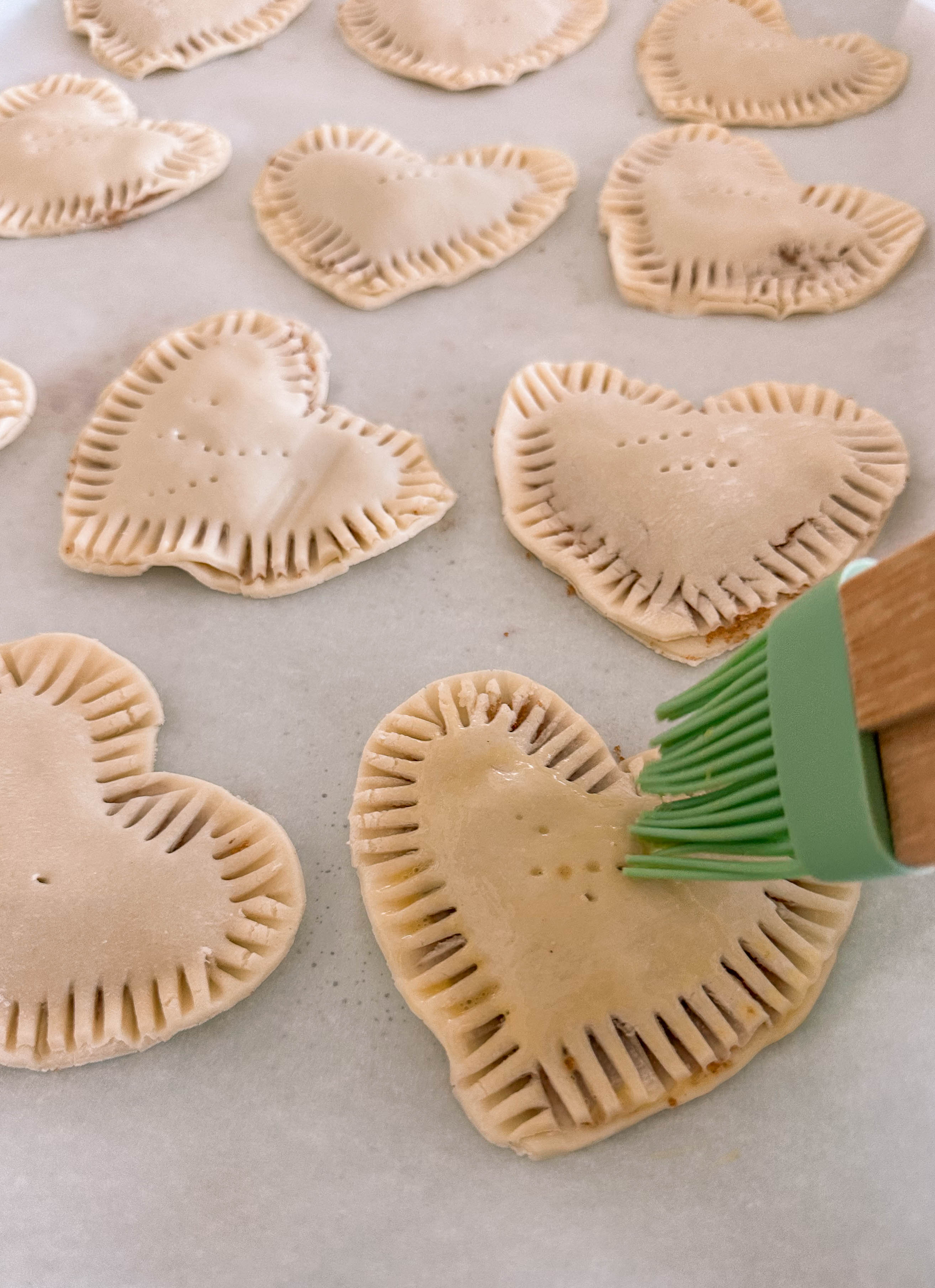 heart poptarts, cherry poptarts, brown sugar poptarts, cute poptart dessert, easy diy poptarts, valentines day, pastries, cherry almond poptarts, cute gift ideas, bakery box, recipe, easy dessert, frosted poptarts