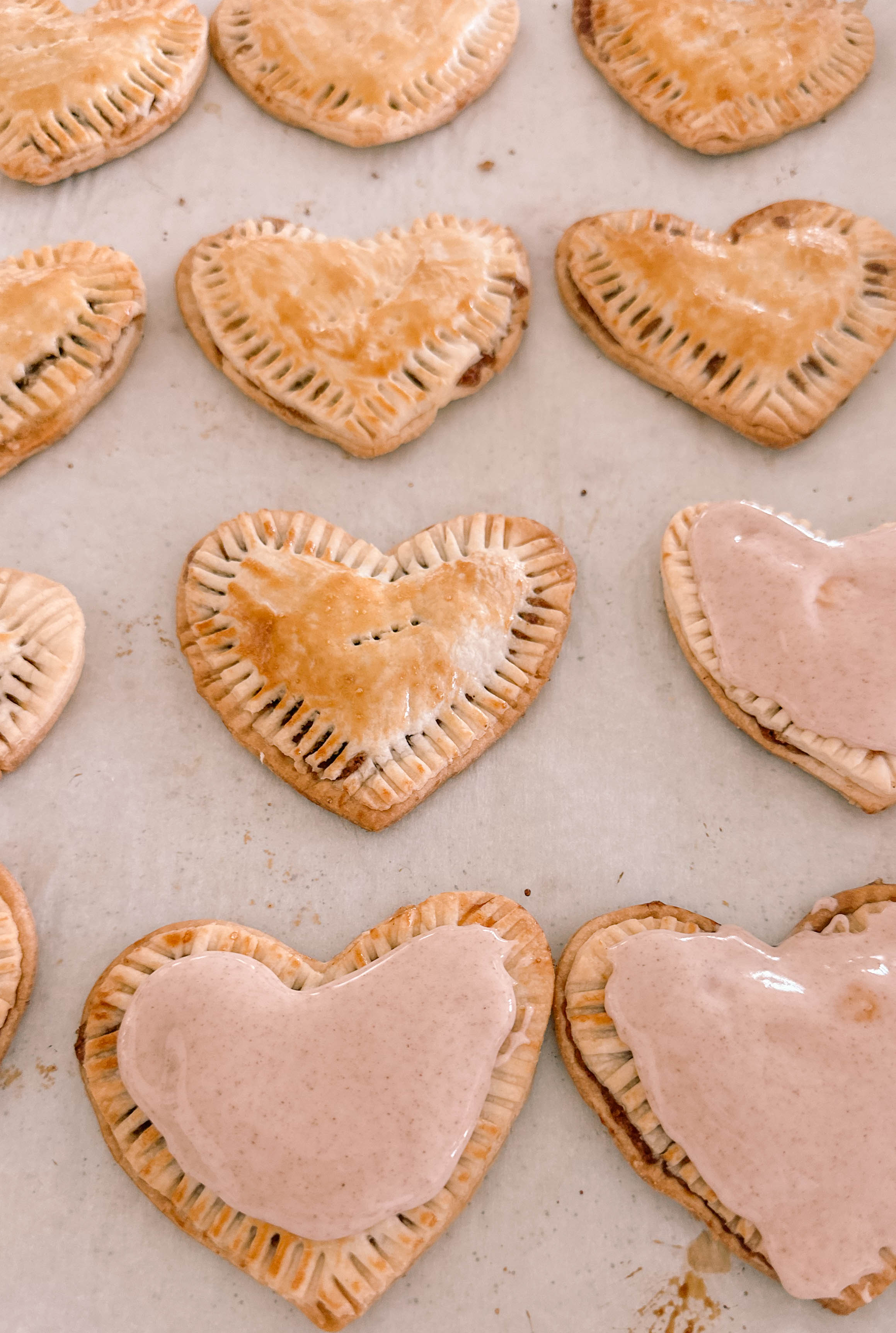 heart poptarts, cherry poptarts, brown sugar poptarts, cute poptart dessert, easy diy poptarts, valentines day, pastries, cherry almond poptarts, cute gift ideas, bakery box, recipe, easy dessert, frosted poptarts