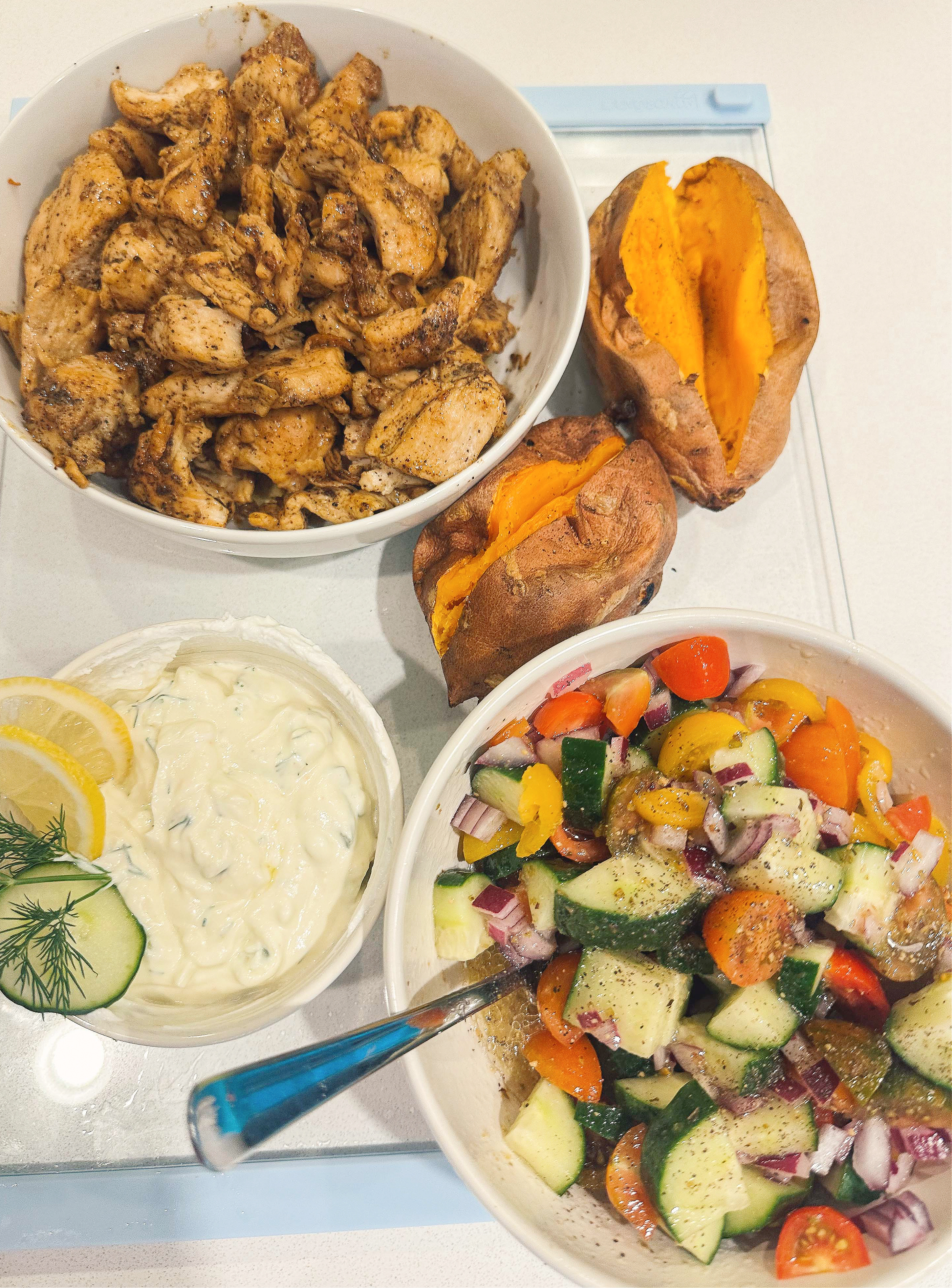 greek bowls, chicken, tzatziki, sweet potato, healthy dinner, gluten free, greek dressing, cucumbers, healthy dinner, easy 30 minute meal, meal prep, recipes, simply taralynn, greek bowls for dinner, dutch oven chicken, easy dinner idea, lemon, family dinner, food prep, nutrition, protein bowls