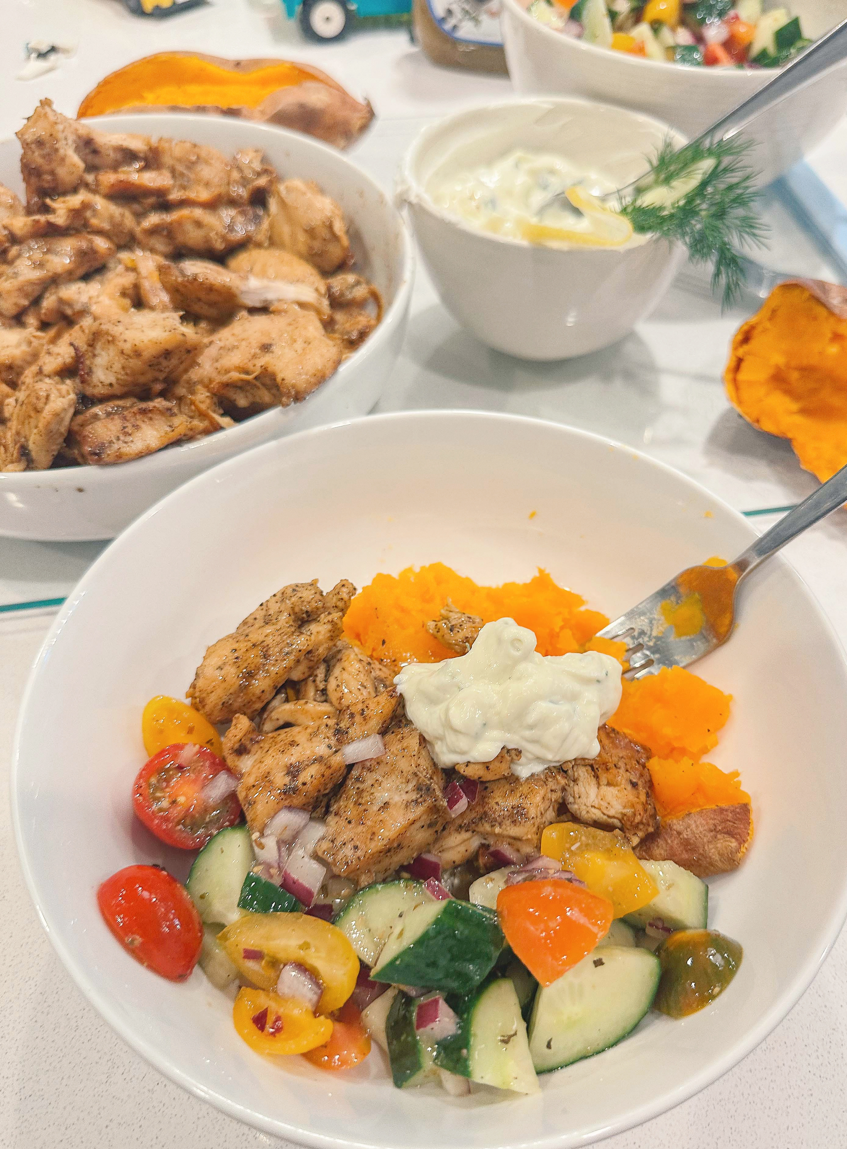 greek bowls, chicken, tzatziki, sweet potato, healthy dinner, gluten free, greek dressing, cucumbers, healthy dinner, easy 30 minute meal, meal prep, recipes, simply taralynn, greek bowls for dinner, dutch oven chicken, easy dinner idea, lemon, family dinner, food prep, nutrition, protein bowls