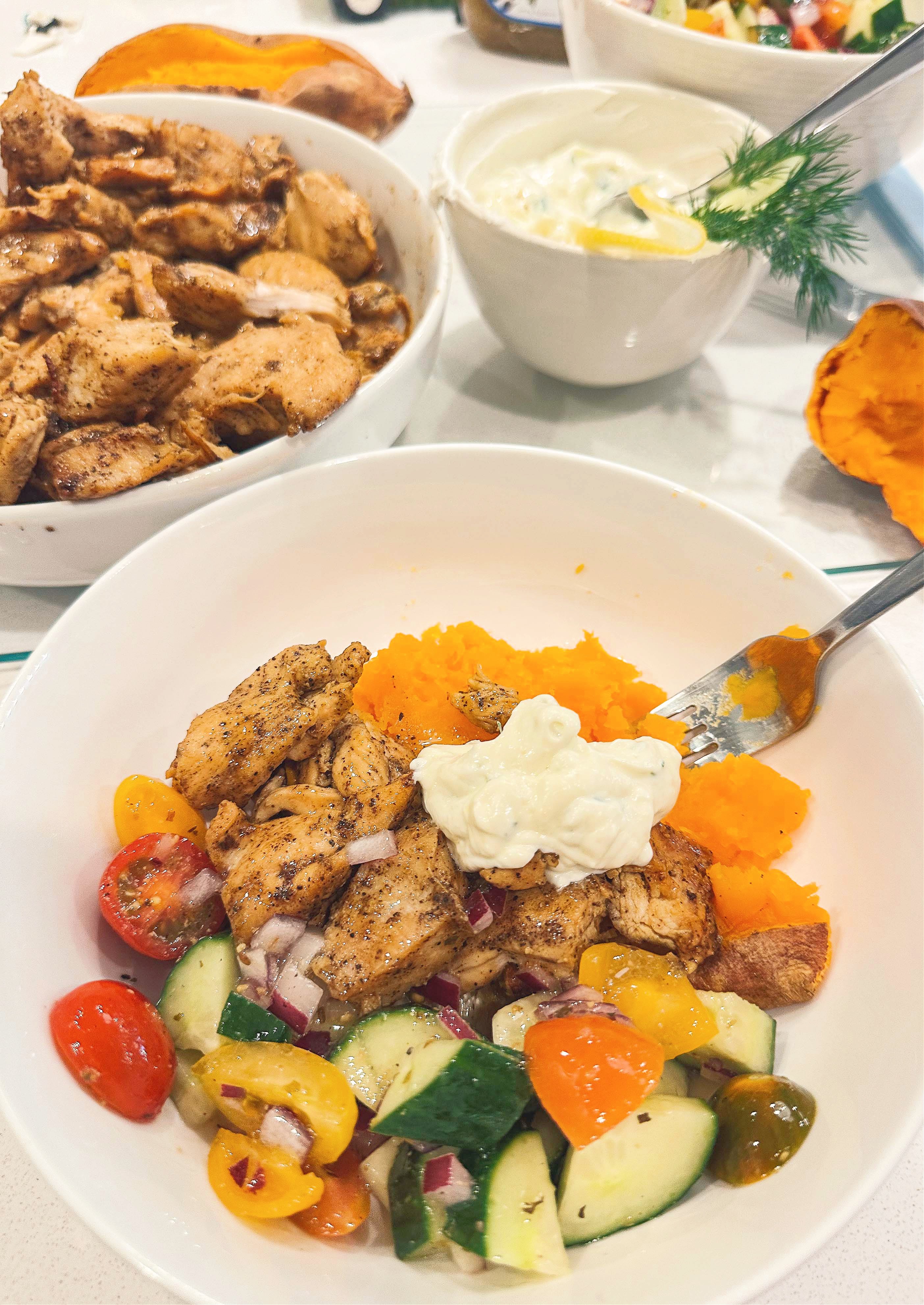 greek bowls, chicken, tzatziki, sweet potato, healthy dinner, gluten free, greek dressing, cucumbers, healthy dinner, easy 30 minute meal, meal prep, recipes, simply taralynn, greek bowls for dinner, dutch oven chicken, easy dinner idea, lemon, family dinner, food prep, nutrition, protein bowls