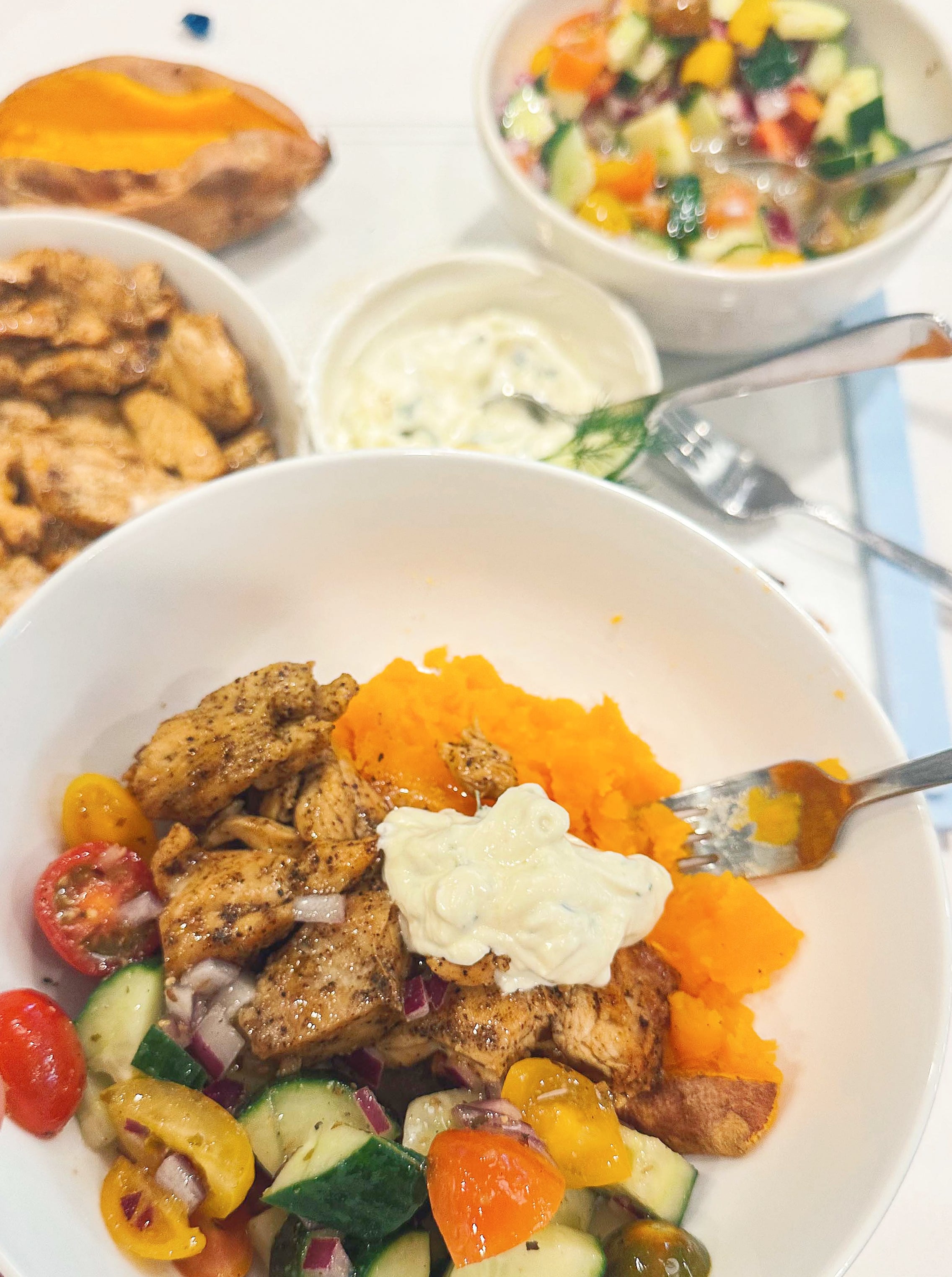 greek bowls, chicken, tzatziki, sweet potato, healthy dinner, gluten free, greek dressing, cucumbers, healthy dinner, easy 30 minute meal, meal prep, recipes, simply taralynn, greek bowls for dinner, dutch oven chicken, easy dinner idea, lemon, family dinner, food prep, nutrition, protein bowls