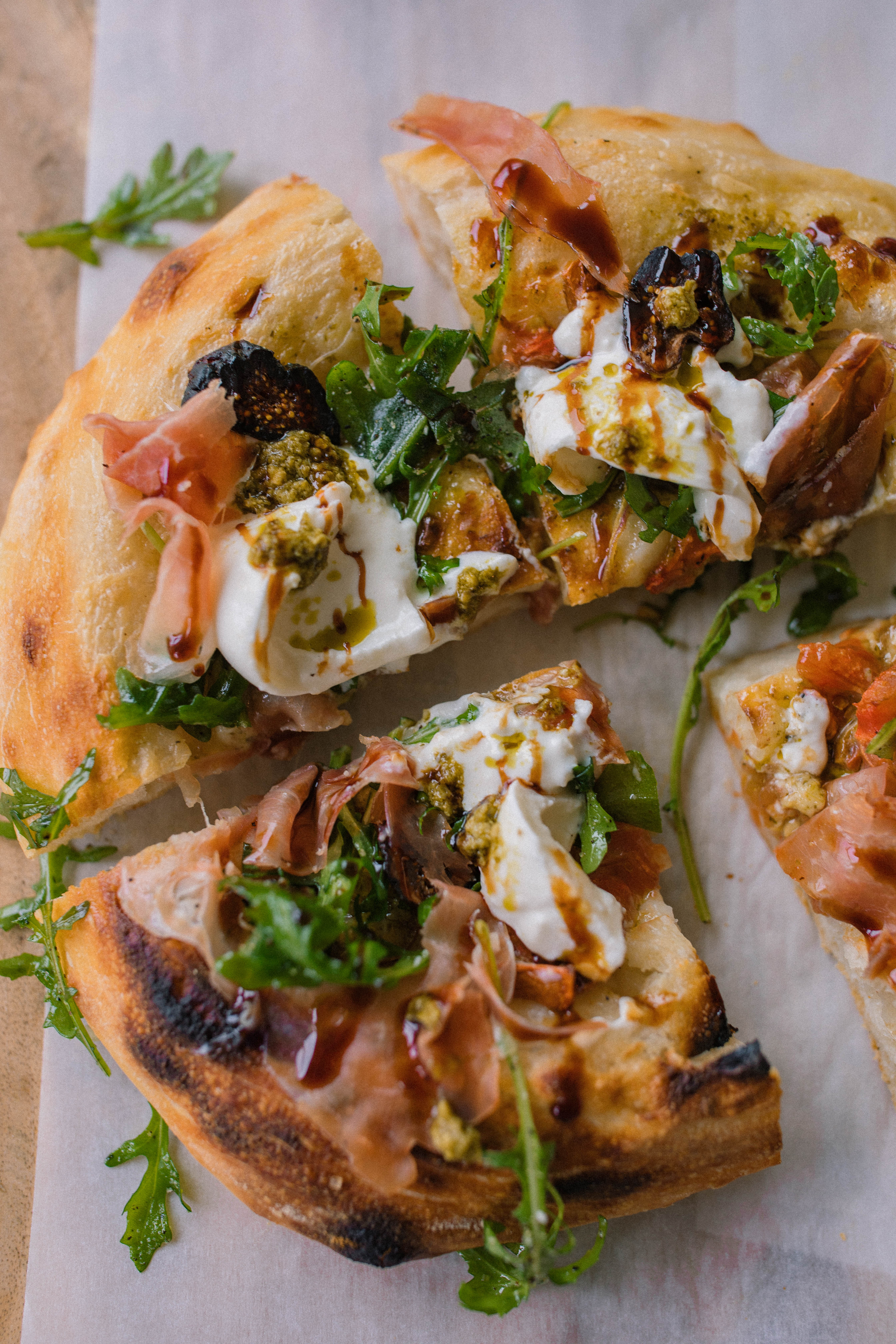 sourdough pizza, prosciutto, balsamic, glaze, figs, pesto, pizza recipe, charcuterie pizza, best recipe ever, sourdough, puffy crust