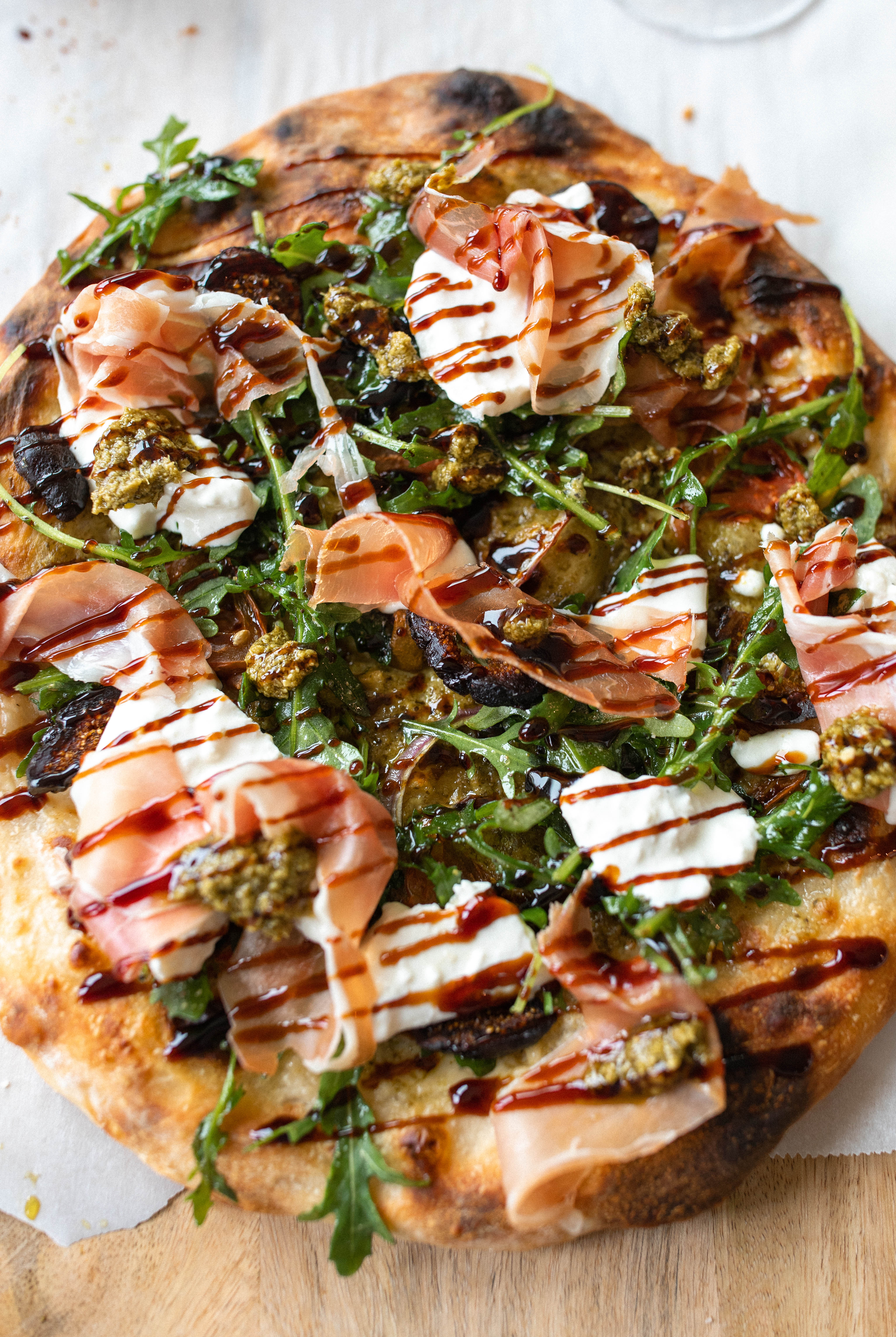 sourdough pizza, prosciutto, balsamic, glaze, figs, pesto, pizza recipe, charcuterie pizza, best recipe ever, sourdough, puffy crust