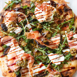sourdough pizza, prosciutto, balsamic, glaze, figs, pesto, pizza recipe, charcuterie pizza, best recipe ever, sourdough, puffy crust