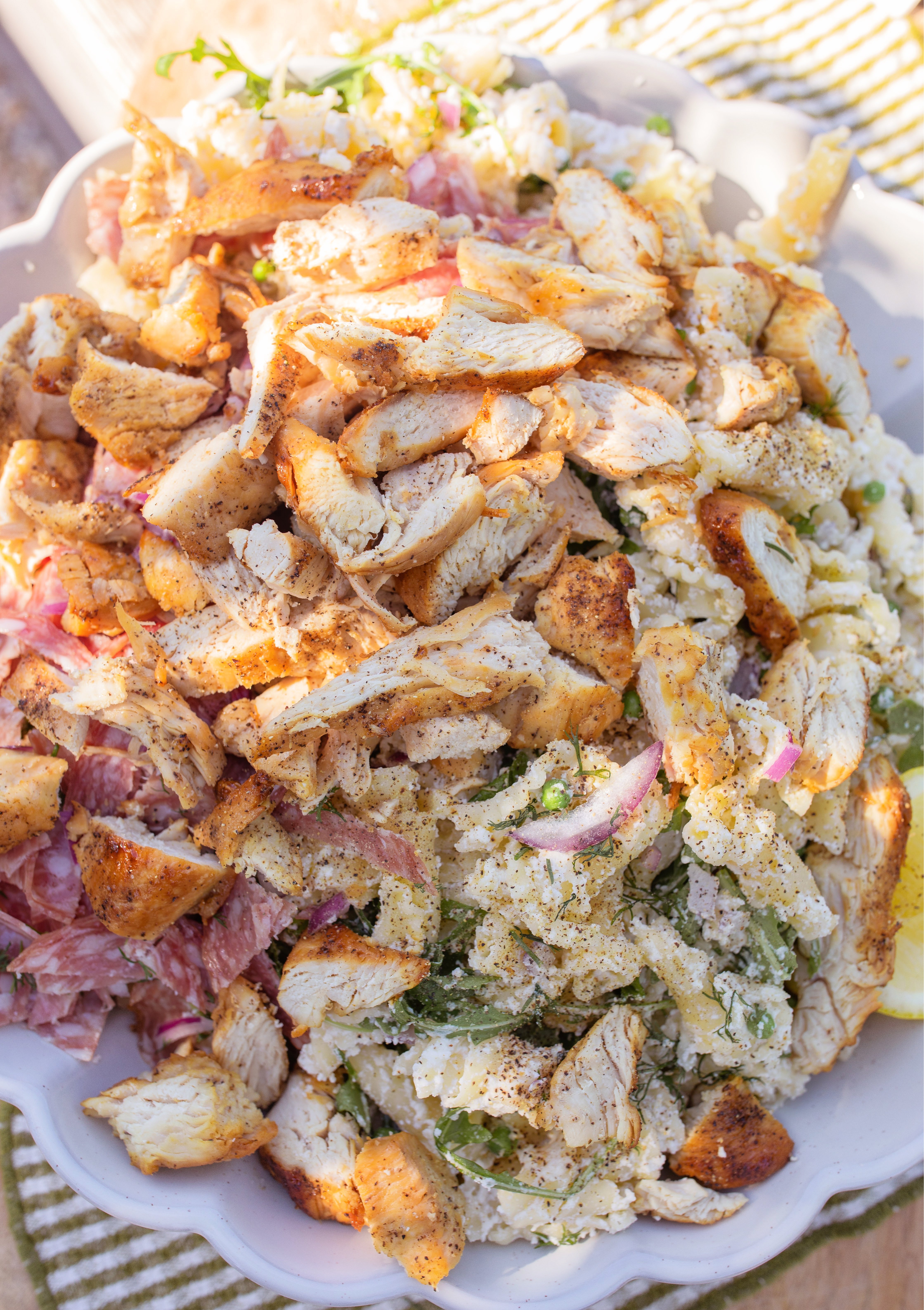 pasta salad, arugula, trader joes, salami, cold pasta salad recipe, ricotta, lemon ricotta pasta salad, pepper, sea salt, garlic, grilled chicken, healthy recipes, spring recipes, potluck, easy to make, lemon pasta, garlic, arugula salad, pasta salad for summer, summer recipes, beautiful pasta