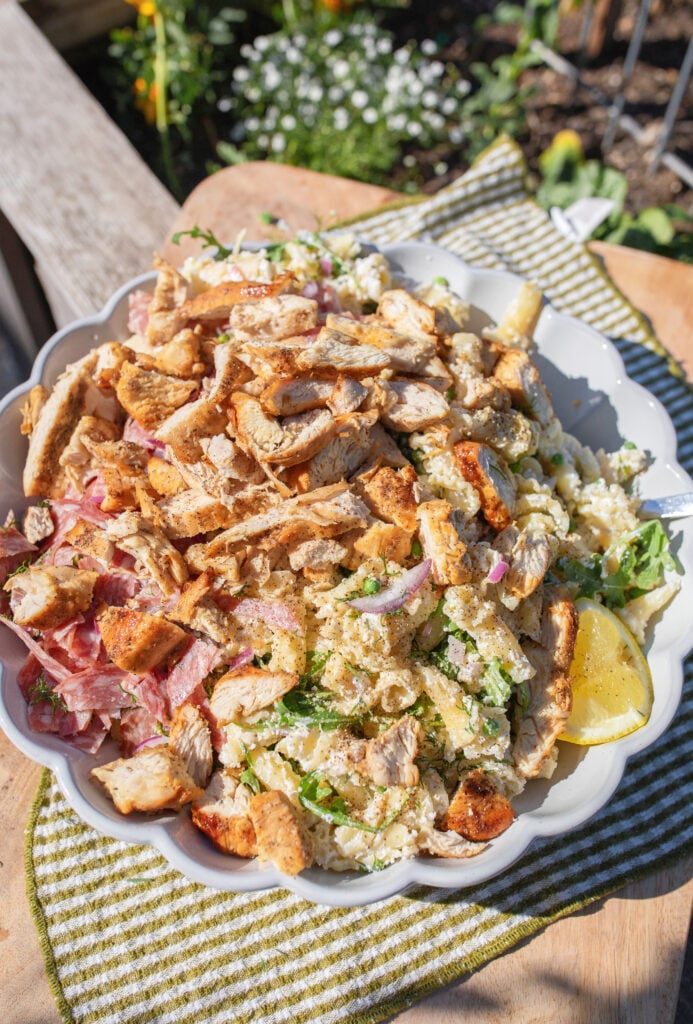 pasta salad, arugula, trader joes, salami, cold pasta salad recipe, ricotta, lemon ricotta pasta salad, pepper, sea salt, garlic, grilled chicken, healthy recipes, spring recipes, potluck, easy to make, lemon pasta, garlic, arugula salad, pasta salad for summer, summer recipes, beautiful pasta