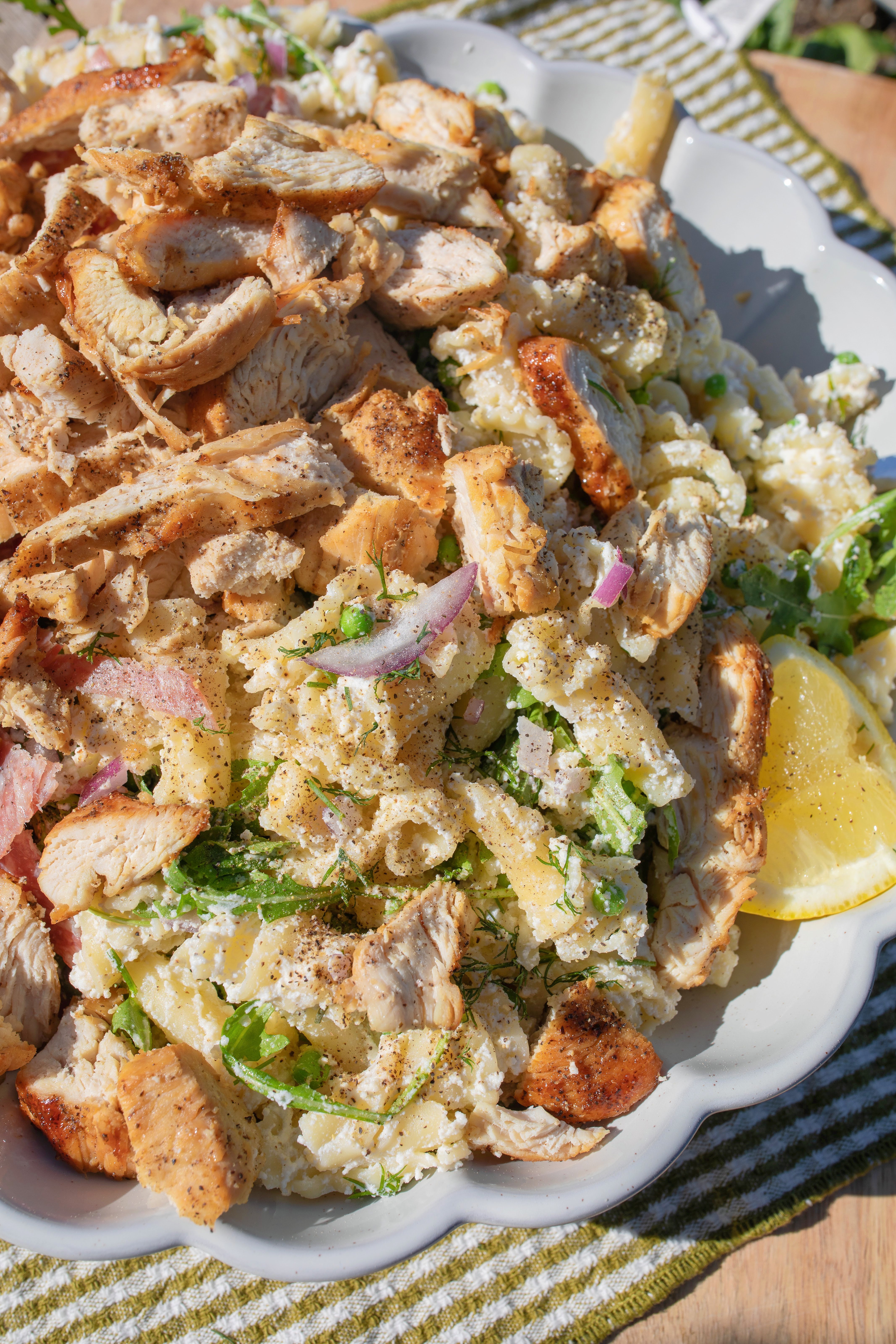 pasta salad, arugula, trader joes, salami, cold pasta salad recipe, ricotta, lemon ricotta pasta salad, pepper, sea salt, garlic, grilled chicken, healthy recipes, spring recipes, potluck, easy to make, lemon pasta, garlic, arugula salad, pasta salad for summer, summer recipes, beautiful pasta