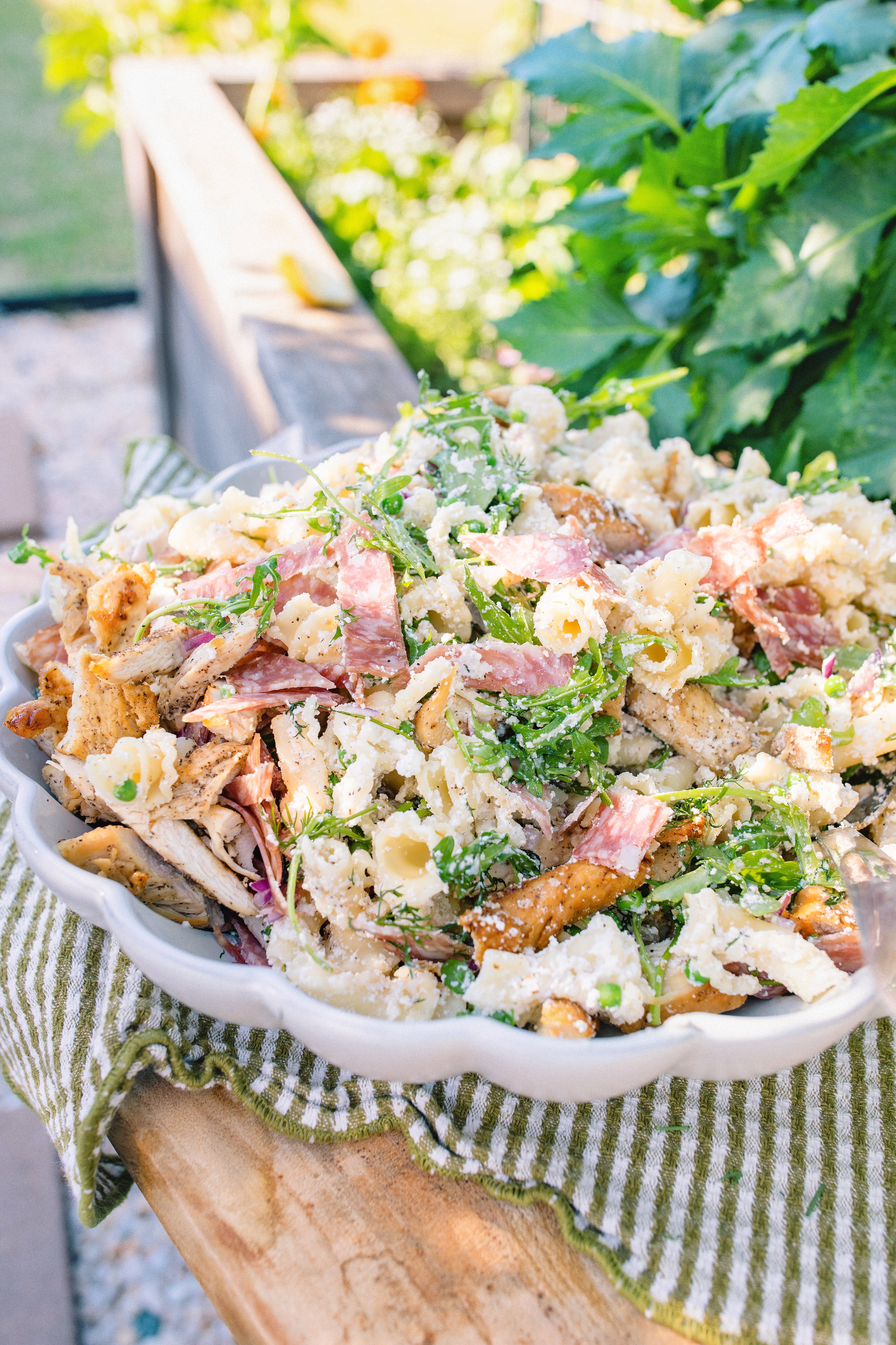 pasta salad, arugula, trader joes, salami, cold pasta salad recipe, ricotta, lemon ricotta pasta salad, pepper, sea salt, garlic, grilled chicken, healthy recipes, spring recipes, potluck, easy to make, lemon pasta, garlic, arugula salad, pasta salad for summer, summer recipes, beautiful pasta 