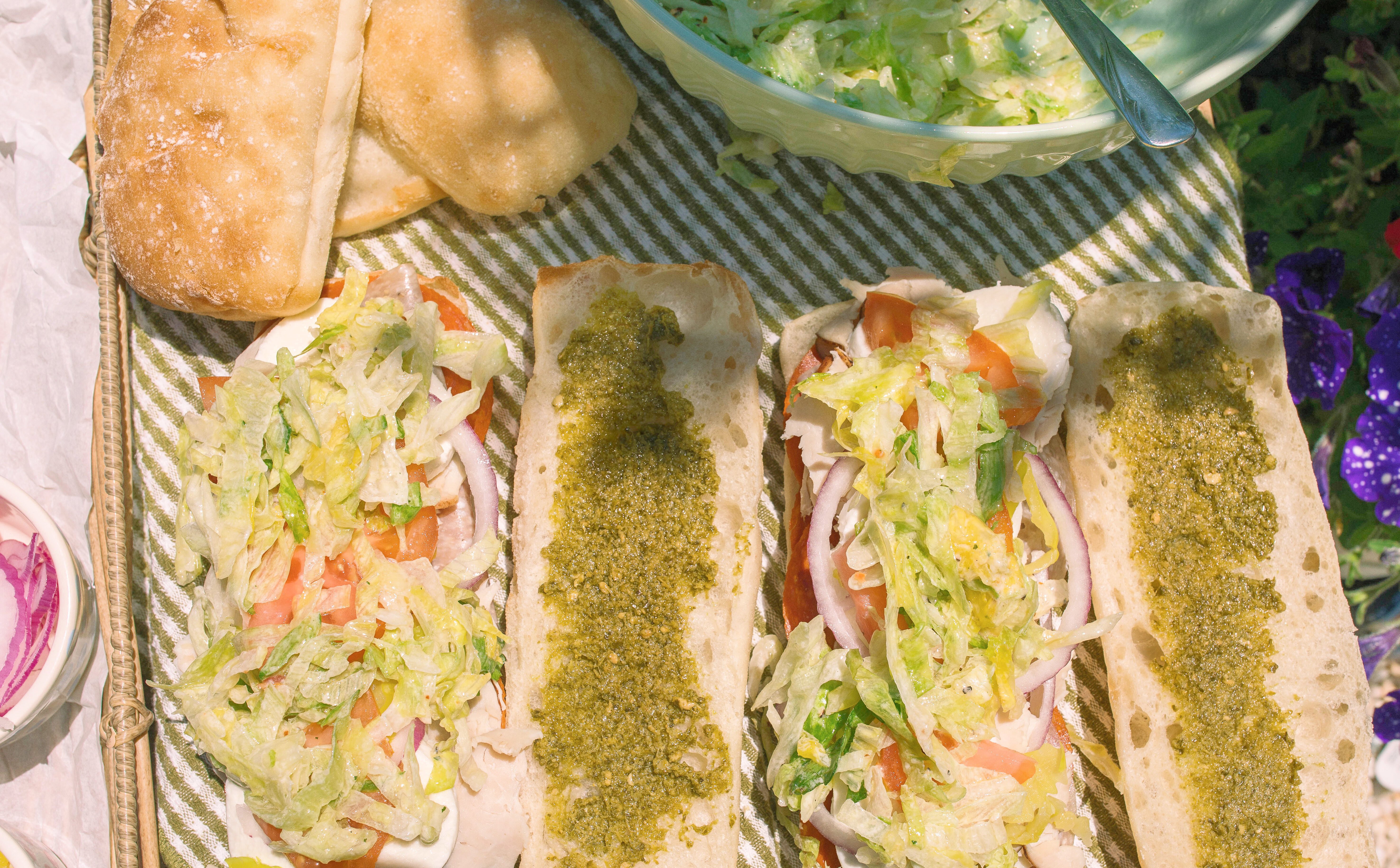 Italian subs, Italian sub recipe, homemade Italian subs, pool day sandwiches, summer sandwich recipes, easy Italian sandwich, toasted Italian subs, deli style subs, Italian hoagie recipe, summer lunch ideas, crowd pleasing sandwiches, family lunch recipes, sandwich recipes for a crowd, mozzarella Italian sandwich, pesto Italian subs, homemade Italian dressing, picnic sandwich ideas, beach sandwiches, pool party food ideas, easy summer meals, Italian grinder sandwich, grinder sandwich recipe, layered Italian sandwich, cold sandwich recipes, hot Italian sandwich, salami sandwich recipe, turkey and salami sandwich, fresh mozzarella sandwich, banana pepper sandwich, bakery bread sandwiches, easy entertaining recipes, lunch sandwich ideas, make ahead sandwiches, summer entertaining food, Italian deli sandwich, crispy lettuce sandwich, oven baked subs, easy pool day food, family friendly sandwiches