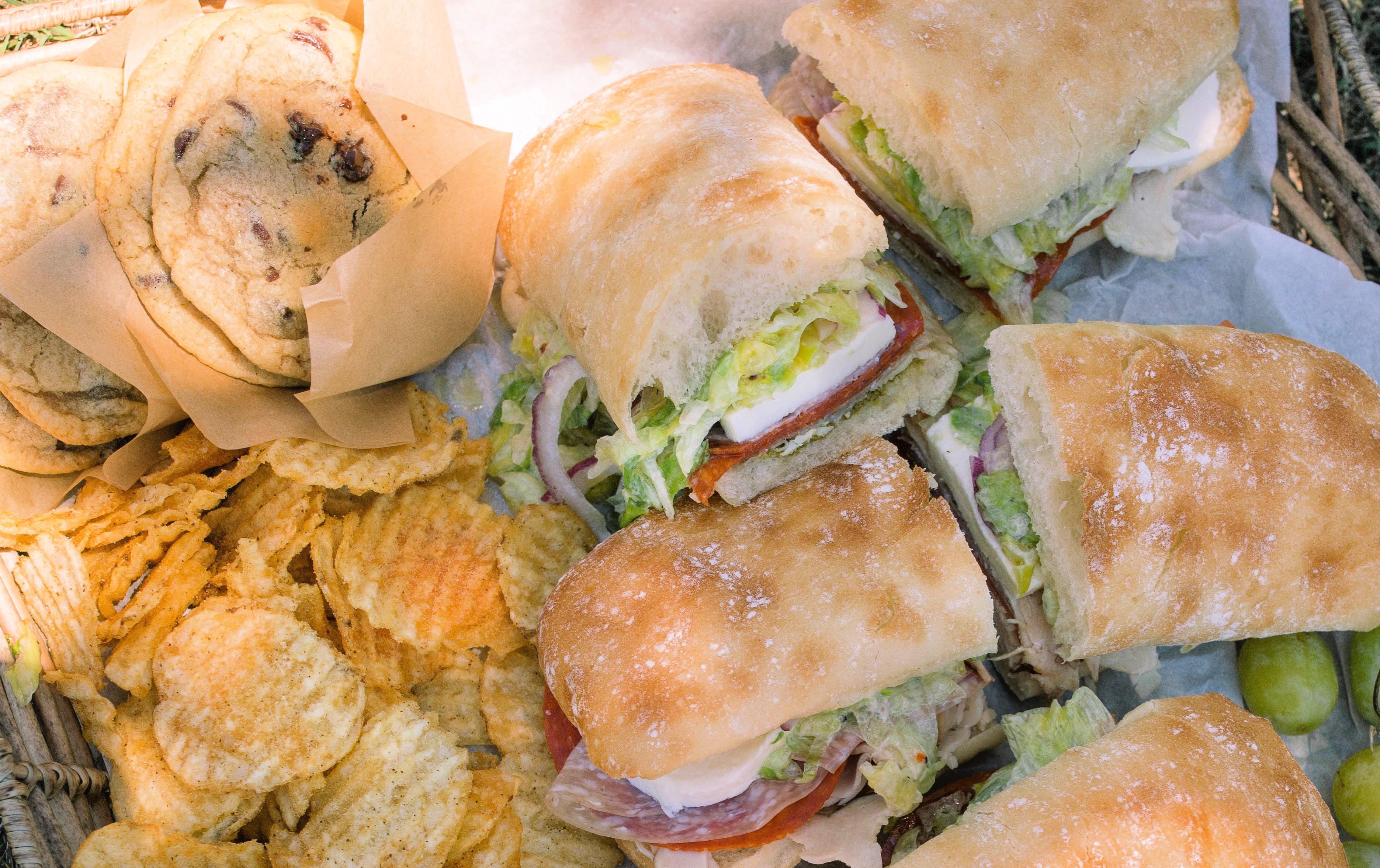 Italian subs, Italian sub recipe, homemade Italian subs, pool day sandwiches, summer sandwich recipes, easy Italian sandwich, toasted Italian subs, deli style subs, Italian hoagie recipe, summer lunch ideas, crowd pleasing sandwiches, family lunch recipes, sandwich recipes for a crowd, mozzarella Italian sandwich, pesto Italian subs, homemade Italian dressing, picnic sandwich ideas, beach sandwiches, pool party food ideas, easy summer meals, Italian grinder sandwich, grinder sandwich recipe, layered Italian sandwich, cold sandwich recipes, hot Italian sandwich, salami sandwich recipe, turkey and salami sandwich, fresh mozzarella sandwich, banana pepper sandwich, bakery bread sandwiches, easy entertaining recipes, lunch sandwich ideas, make ahead sandwiches, summer entertaining food, Italian deli sandwich, crispy lettuce sandwich, oven baked subs, easy pool day food, family friendly sandwiches