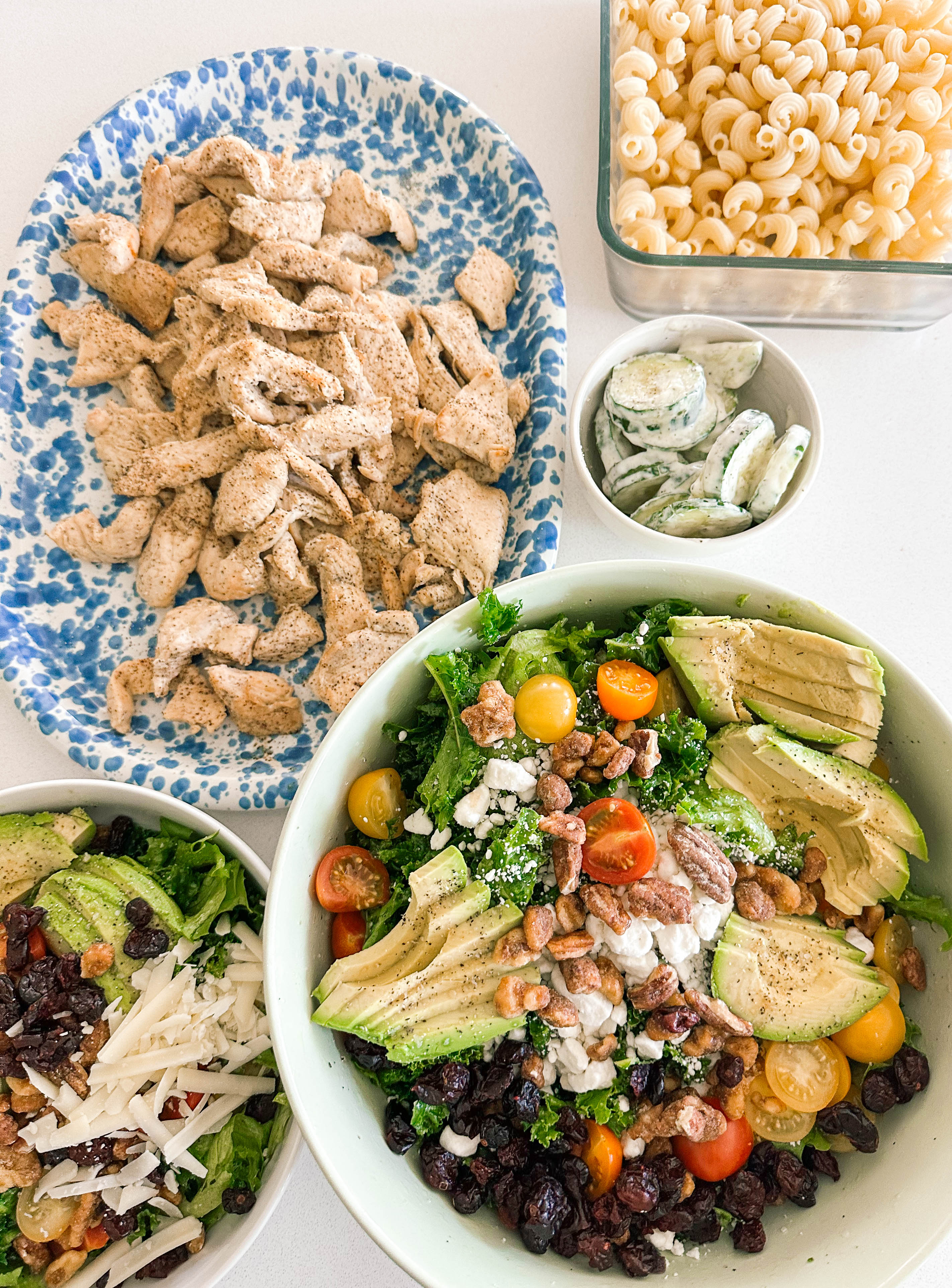 spring kale salad, goat cheese, candied pecans, candied walnuts, arctic seasoning, cranberries, tomatoes, avocado, healthy, dinner, kale salad, pasta kale salad, summer salad, healthy eating, chicken, dutch oven cooked chicken, recipes