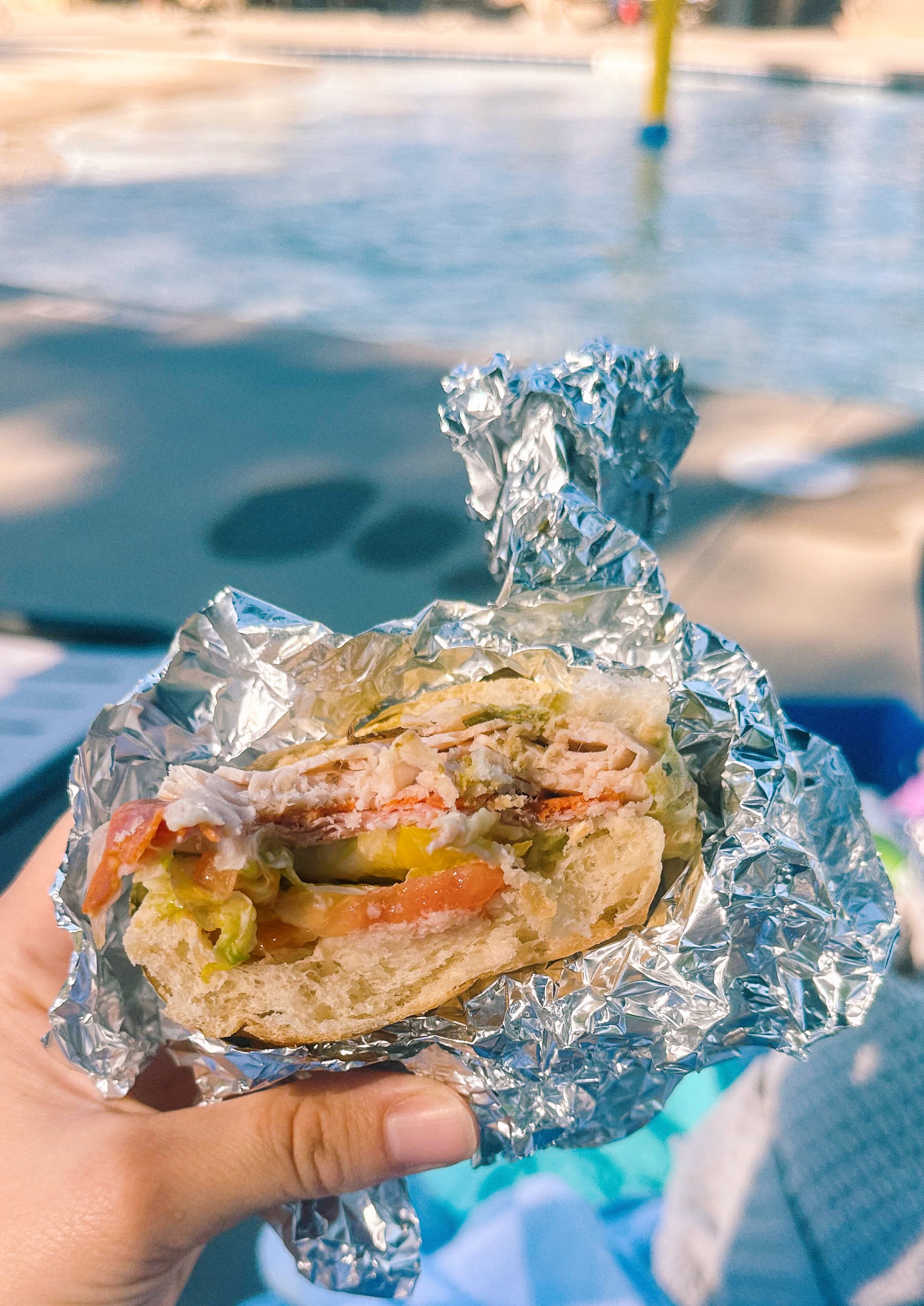 Italian subs, Italian sub recipe, homemade Italian subs, pool day sandwiches, summer sandwich recipes, easy Italian sandwich, toasted Italian subs, deli style subs, Italian hoagie recipe, summer lunch ideas, crowd pleasing sandwiches, family lunch recipes, sandwich recipes for a crowd, mozzarella Italian sandwich, pesto Italian subs, homemade Italian dressing, picnic sandwich ideas, beach sandwiches, pool party food ideas, easy summer meals, Italian grinder sandwich, grinder sandwich recipe, layered Italian sandwich, cold sandwich recipes, hot Italian sandwich, salami sandwich recipe, turkey and salami sandwich, fresh mozzarella sandwich, banana pepper sandwich, bakery bread sandwiches, easy entertaining recipes, lunch sandwich ideas, make ahead sandwiches, summer entertaining food, Italian deli sandwich, crispy lettuce sandwich, oven baked subs, easy pool day food, family friendly sandwiches