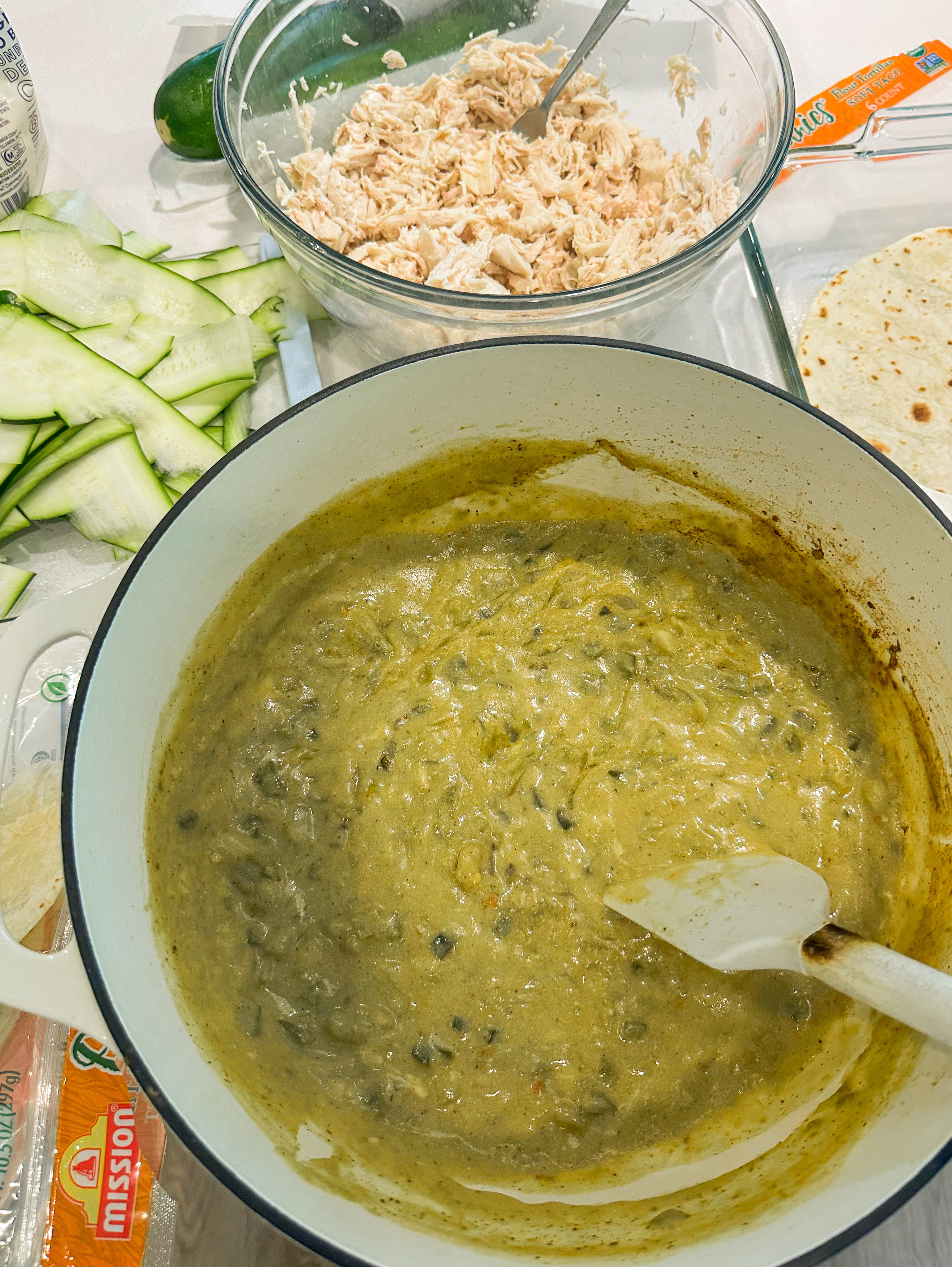 green chile chicken enchilada casserole, chicken enchilada zucchini casserole, creamy chicken enchilada casserole, green enchilada chicken bake, zucchini chicken casserole, easy chicken casserole recipe, shredded chicken casserole, healthy enchilada casserole, green chile casserole recipe, chicken zucchini bake, Mexican chicken casserole, family dinner casserole, cheesy chicken zucchini casserole, poblano chicken casserole, green chile chicken bake, low carb enchilada casserole, baked chicken enchilada casserole, easy weeknight chicken dinner, chicken tortilla casserole, creamy green chile casserole